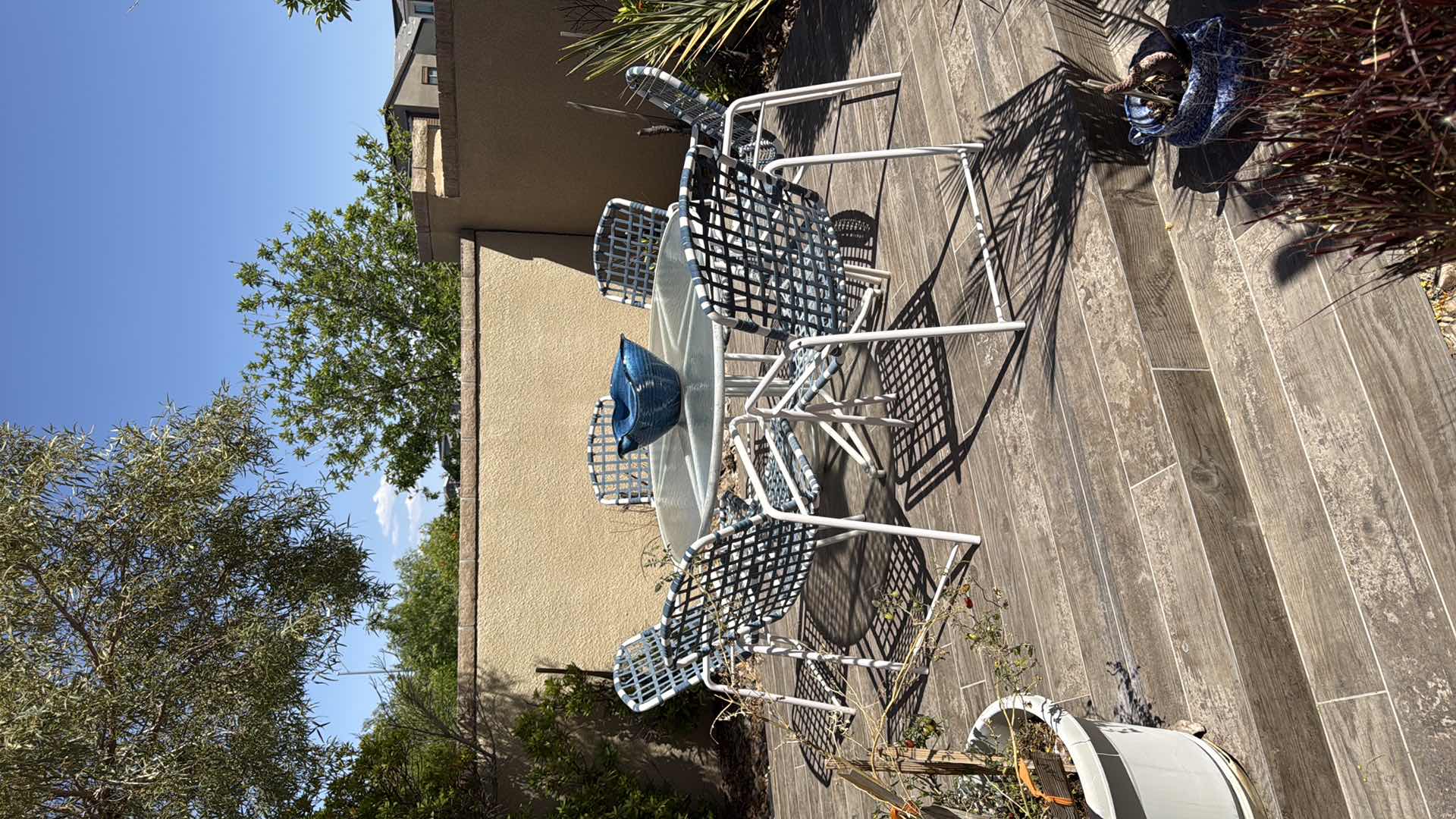 Photo 1 of 48” ROUND WHITE METAL PATIO TABLE W GLASS TOP & 6 ARM CHAIRS