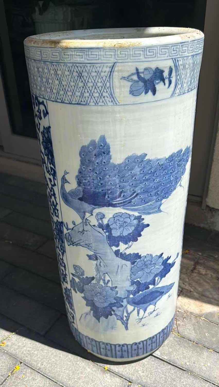 Photo 1 of BLUE & WHITE CERAMIC TALL VASE D11” H24”