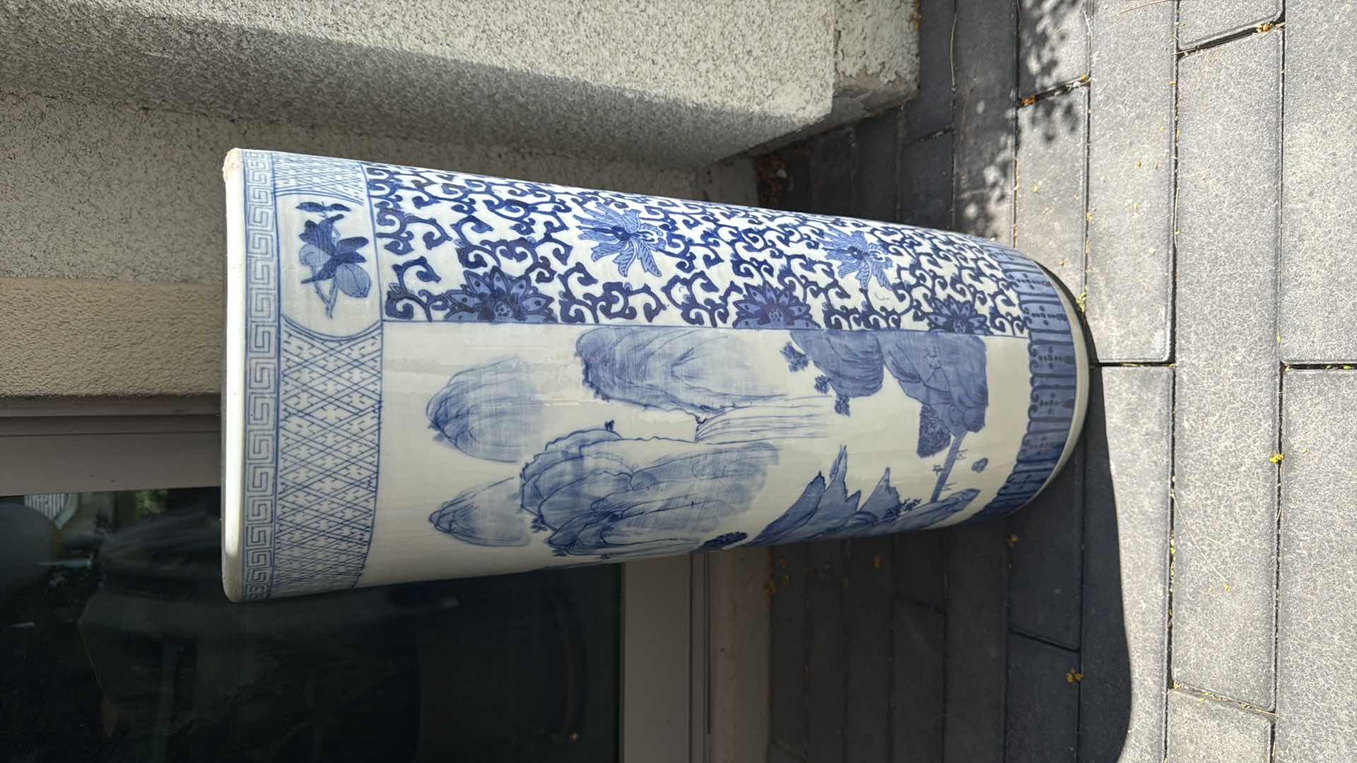 Photo 1 of BLUE & WHITE CERAMIC TALL VASE D11” H24”