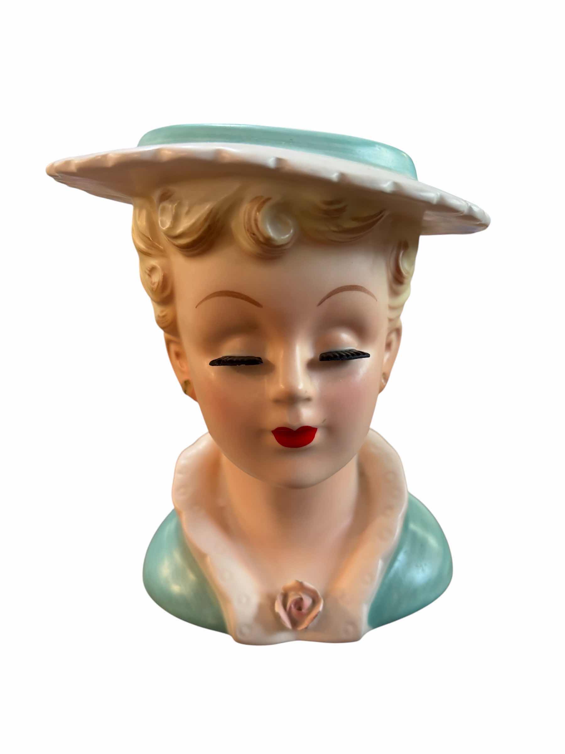 Photo 1 of COLLECTIBLE LADY HEAD VASE $35