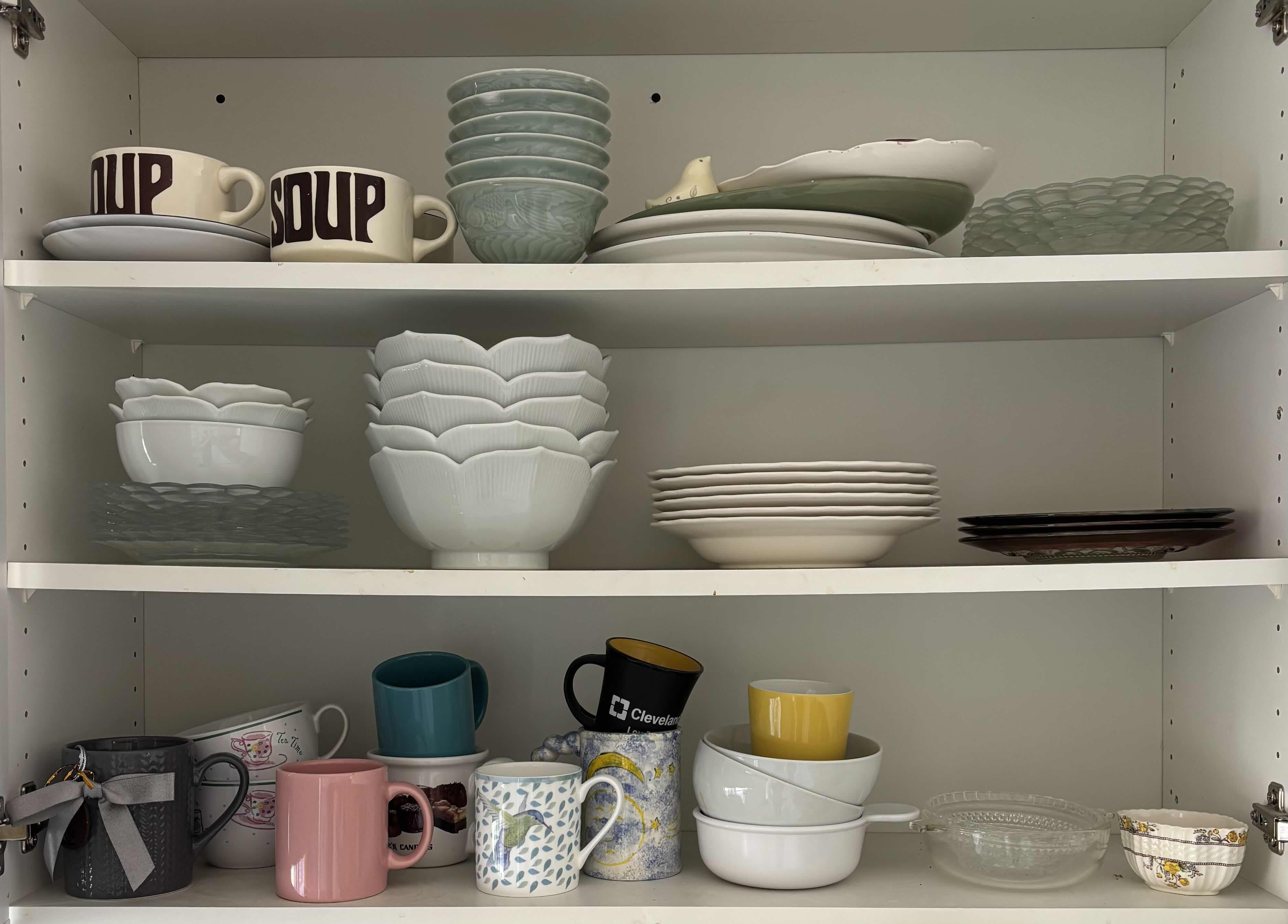 Photo 1 of CONTENTS OF KITCHEN CABINET