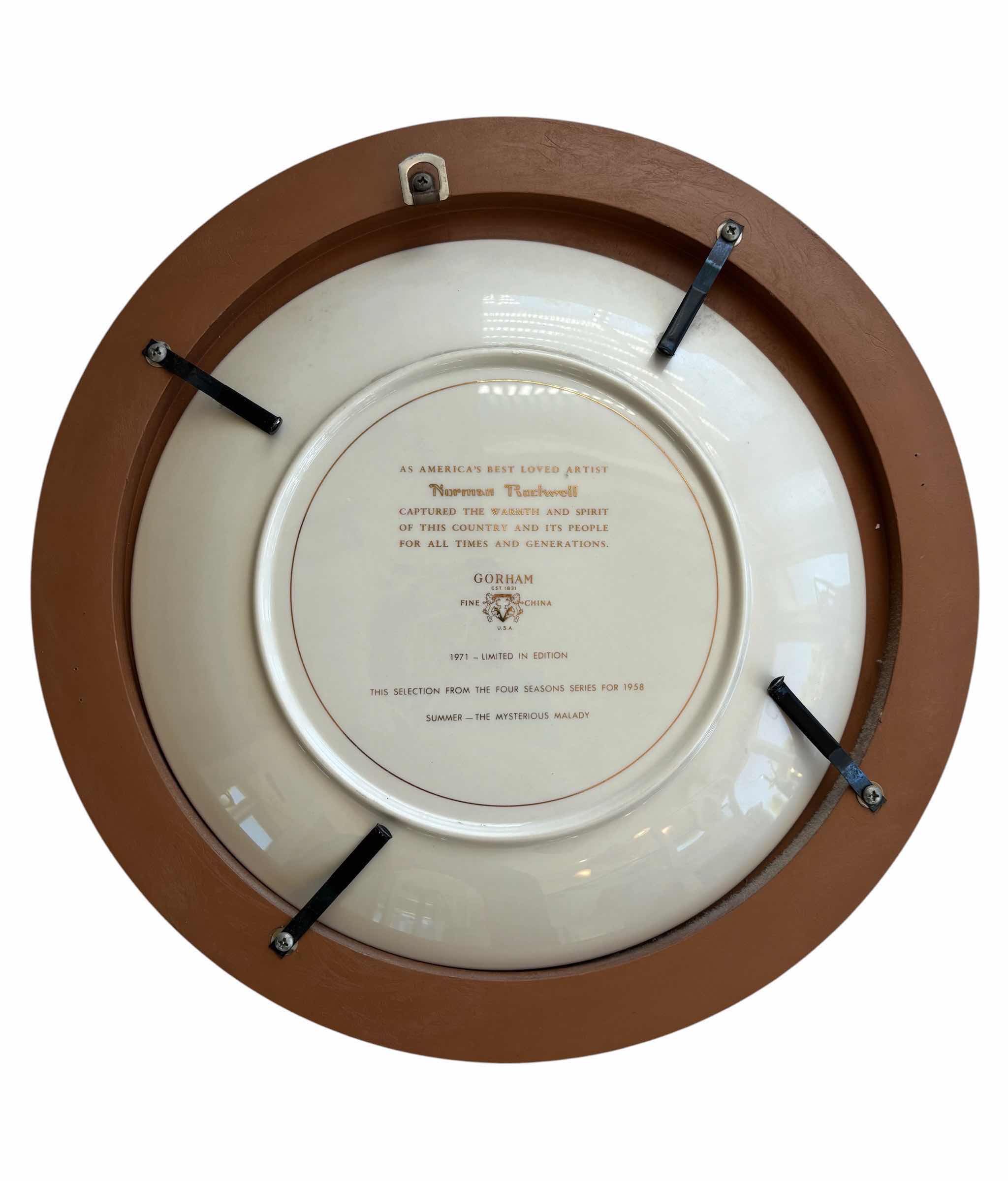 Photo 1 of NORMAN ROCKWELL COLLECTORS PLATE IN WOOD PLATE HOLDER 13.5”D $80