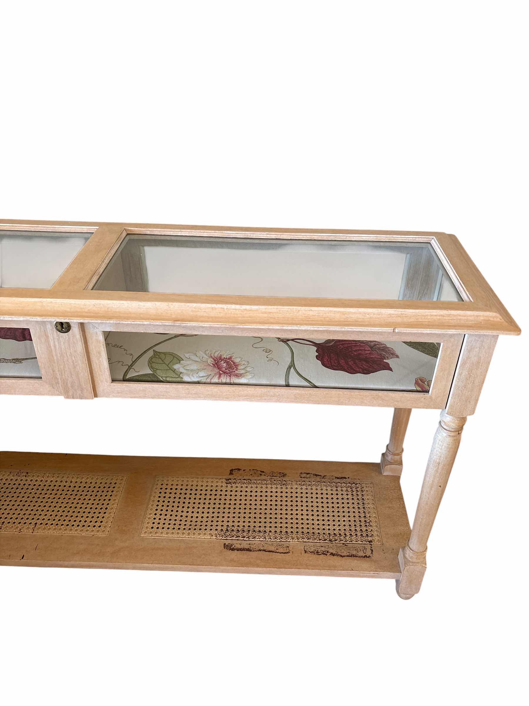 Photo 1 of VINTAGE LIGHT WOOD CONSOLE TABLE W GLASS TOP AND WOVWN RATTAN LOWER SHELF 53”X15”H29” $