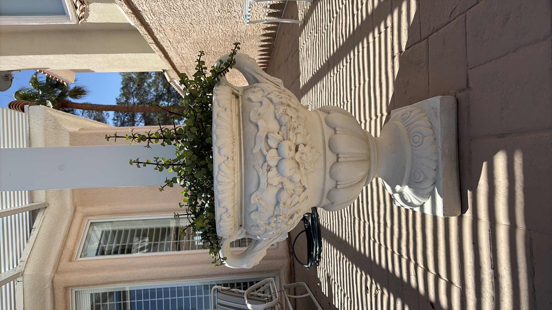 Photo 1 of FRENCH STONE FLORAL MOTIF COMPOSITE PLANTER W LIVE PLANTS H29.5”