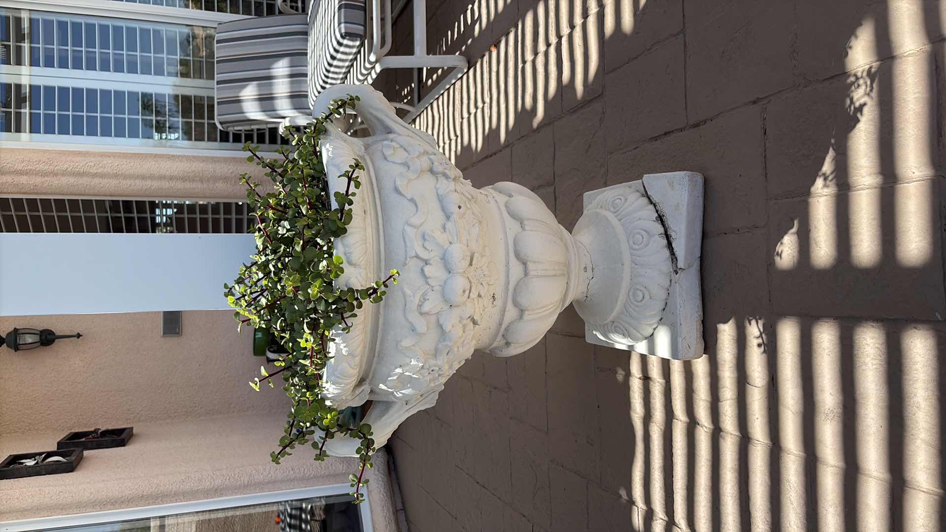 Photo 1 of FRENCH STONE FLORAL MOTIF COMPOSITE PLANTER W LIVE PLANTS H29.5”