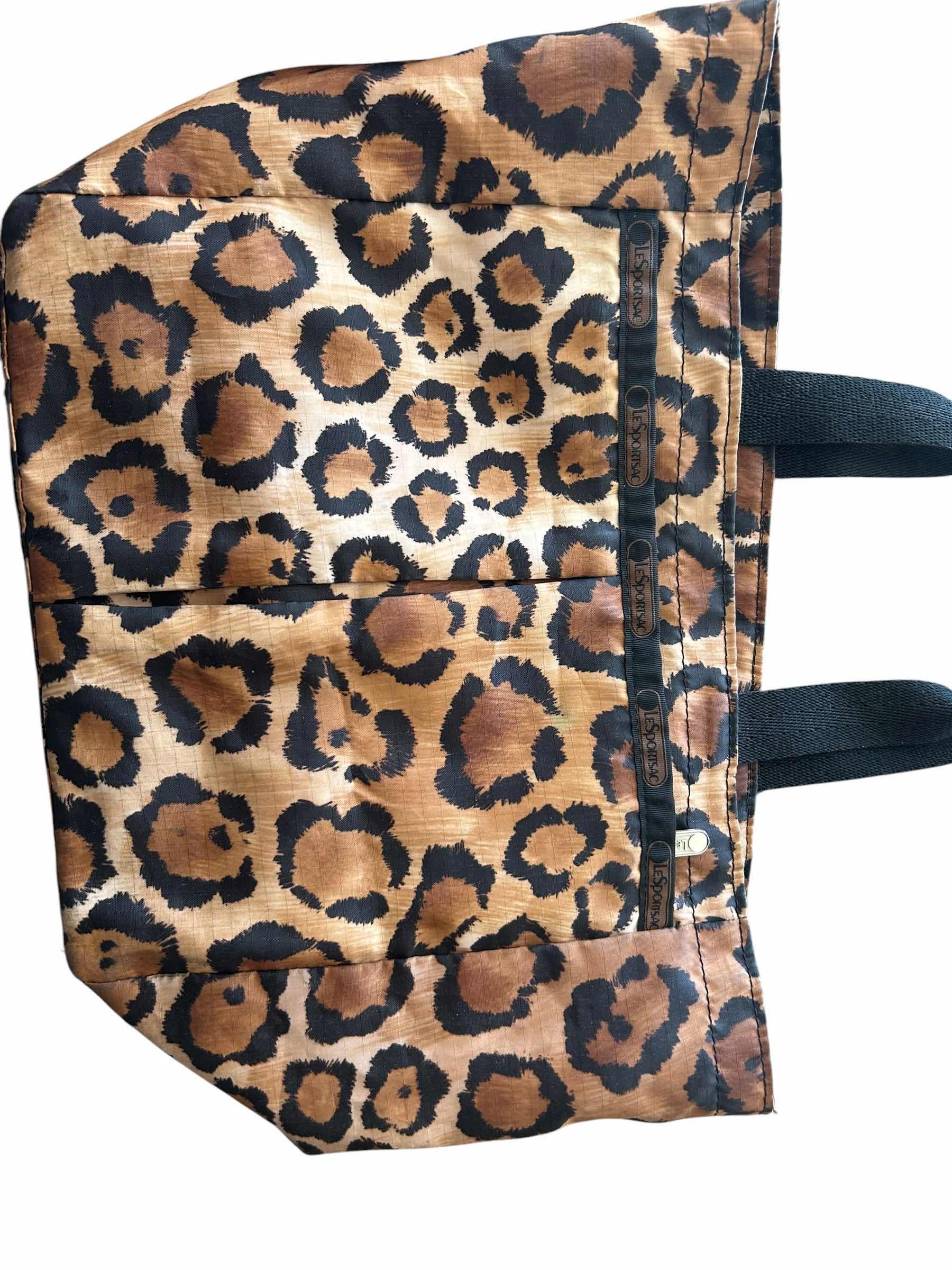 Photo 1 of CHEETAH PRINT AND SPORT PURSES (POLO, LESPORTSAC, ETC.)