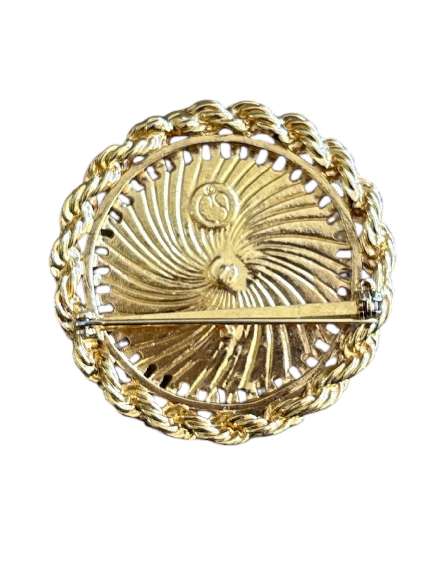 Photo 1 of VINTAGE ST.JOHN GOLD TONE ROUND BROOCH IN STARBURST DESIGN W BRAIDED ROPE BORDER H2”