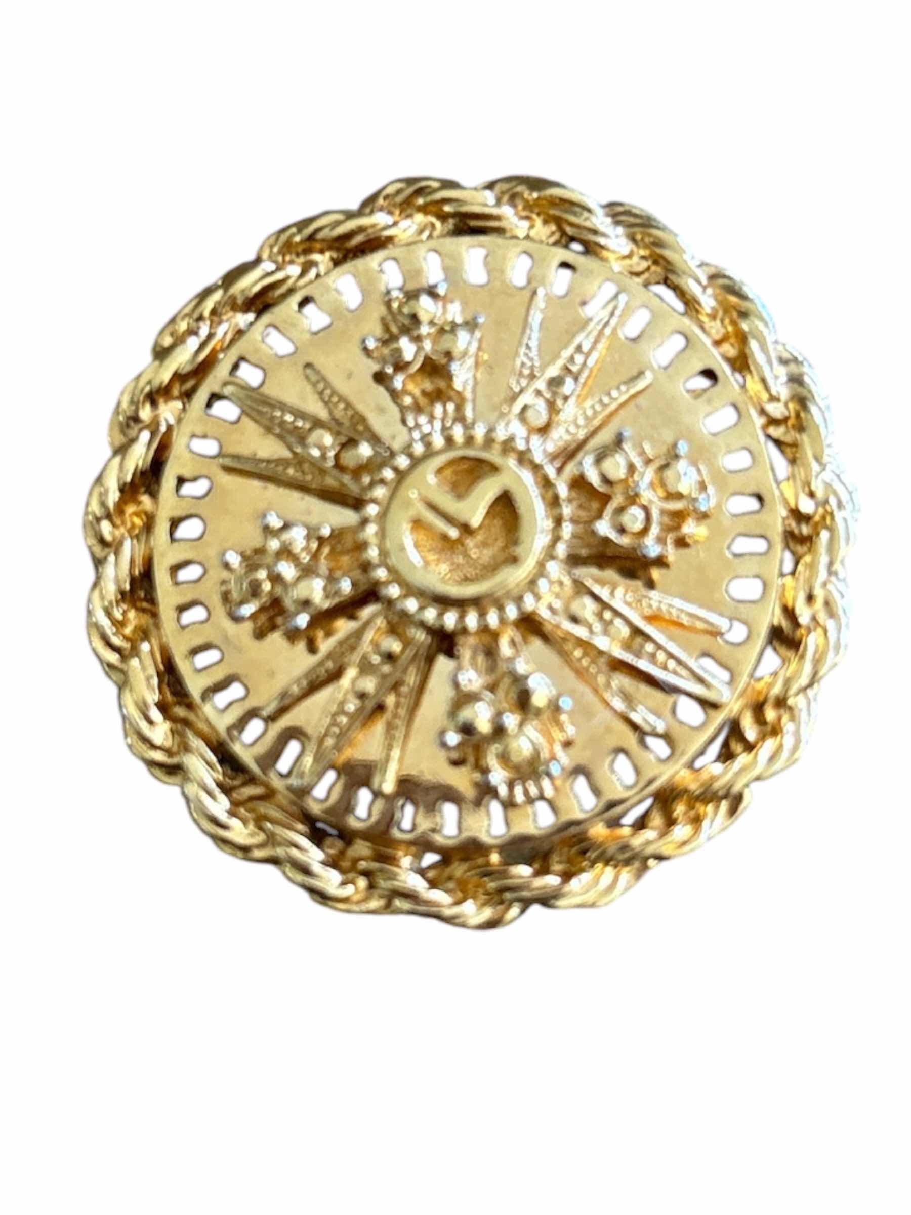 Photo 1 of VINTAGE ST.JOHN GOLD TONE ROUND BROOCH IN STARBURST DESIGN W BRAIDED ROPE BORDER H2”