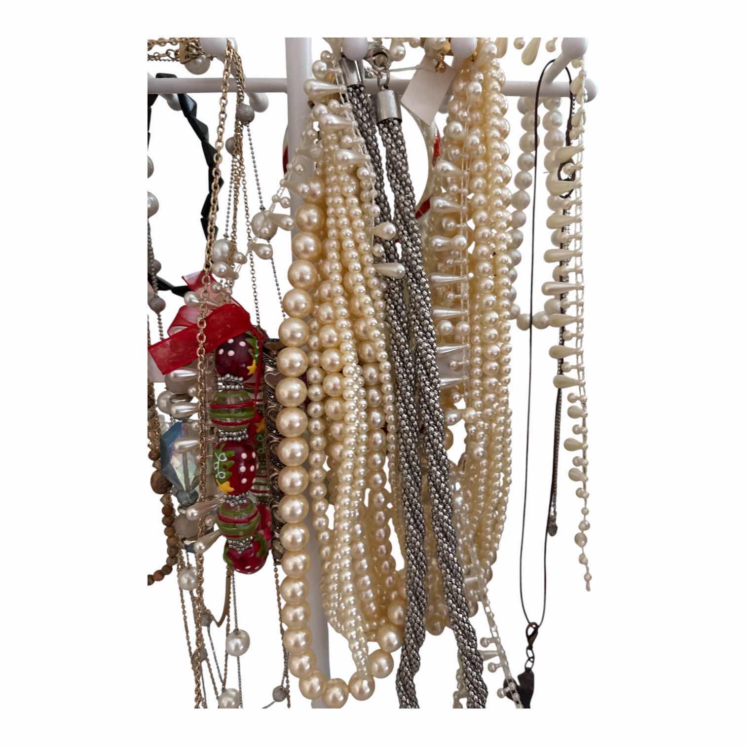 Photo 1 of FAUX PEARLS FASHION JEWELRY ON STAND H14”