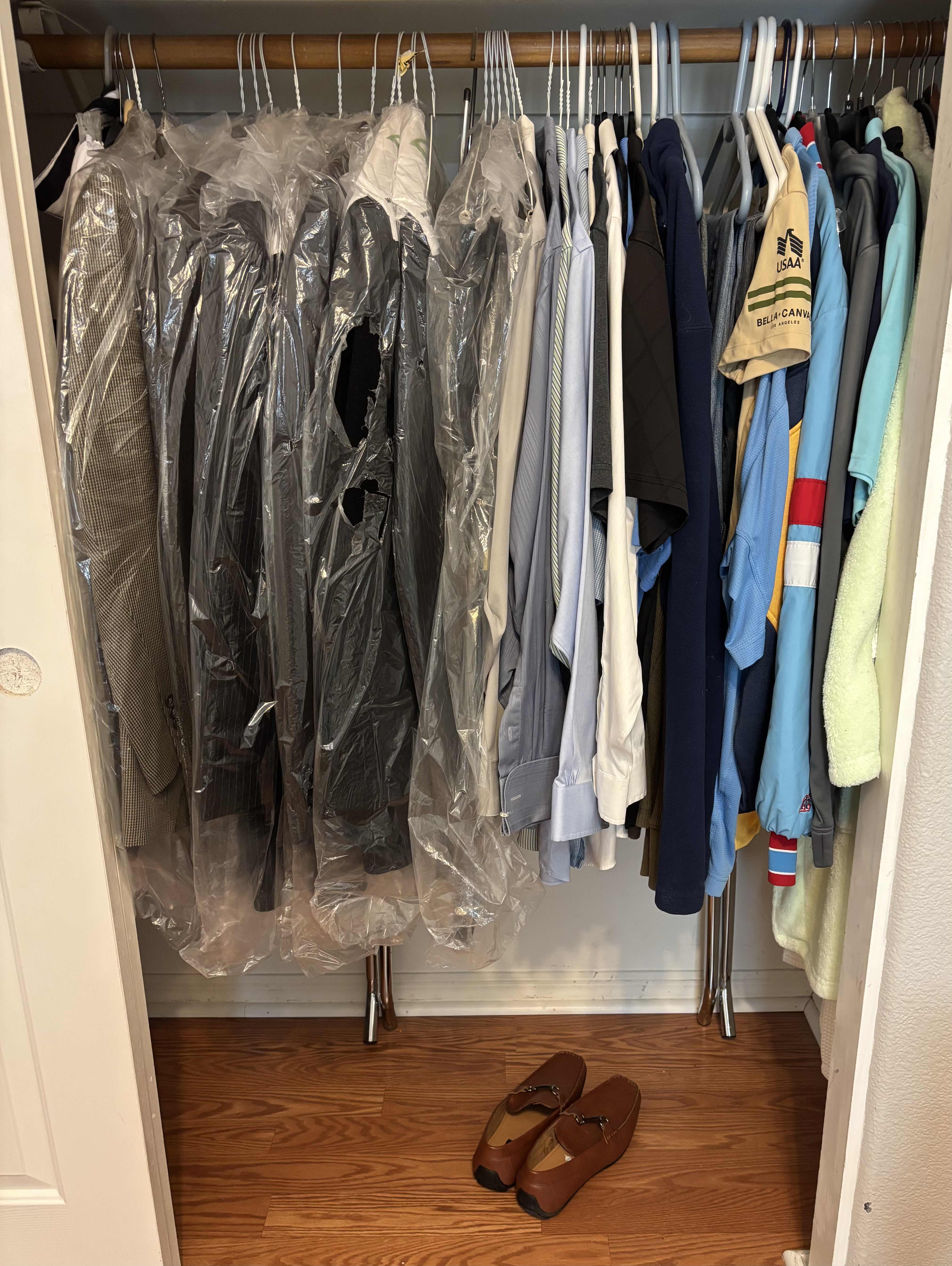 Photo 1 of CONTENTS OF CLOSET: XL MEN’S SHIRTS, 36 PANTS/JEANS