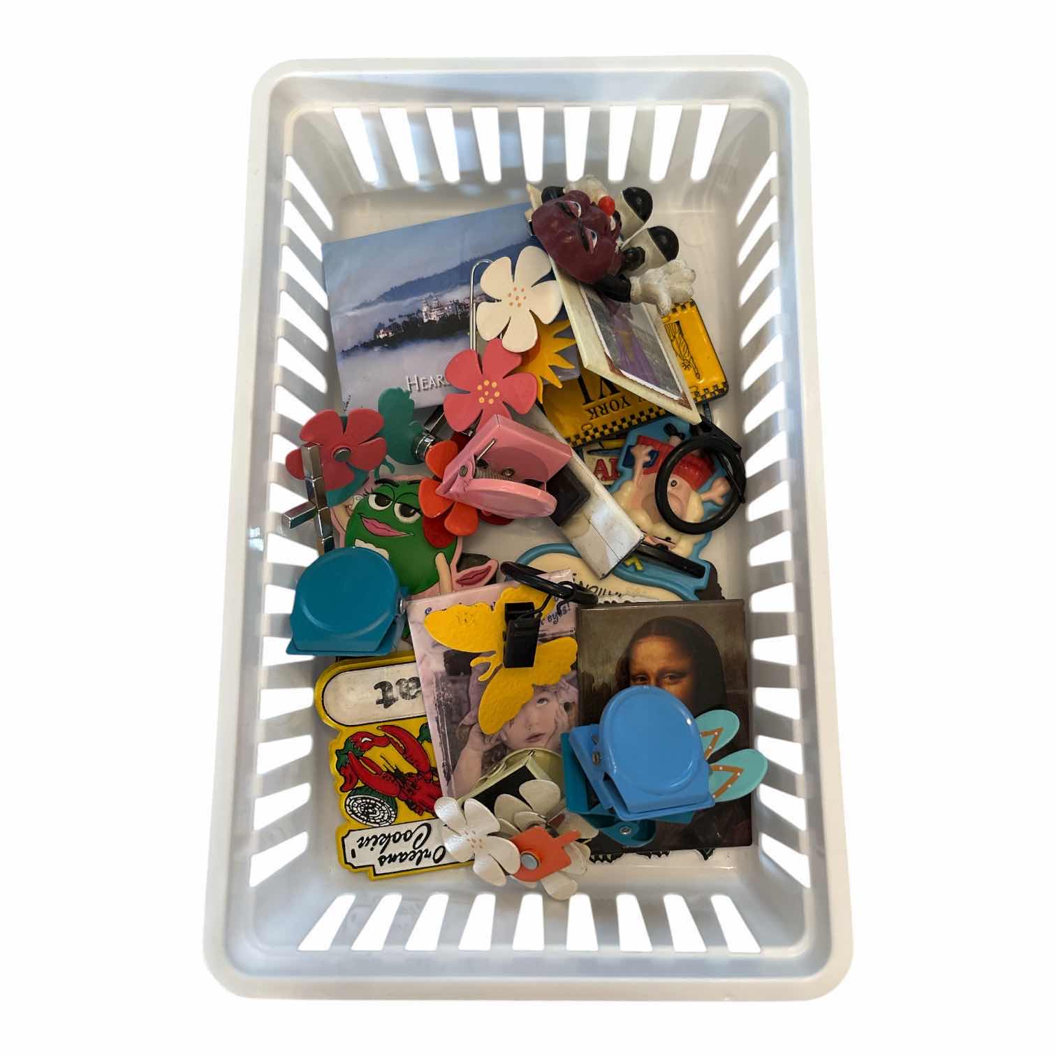 Photo 1 of SMALL CONTAINER OF COLORFUL MAGNETS AND CLIPS
