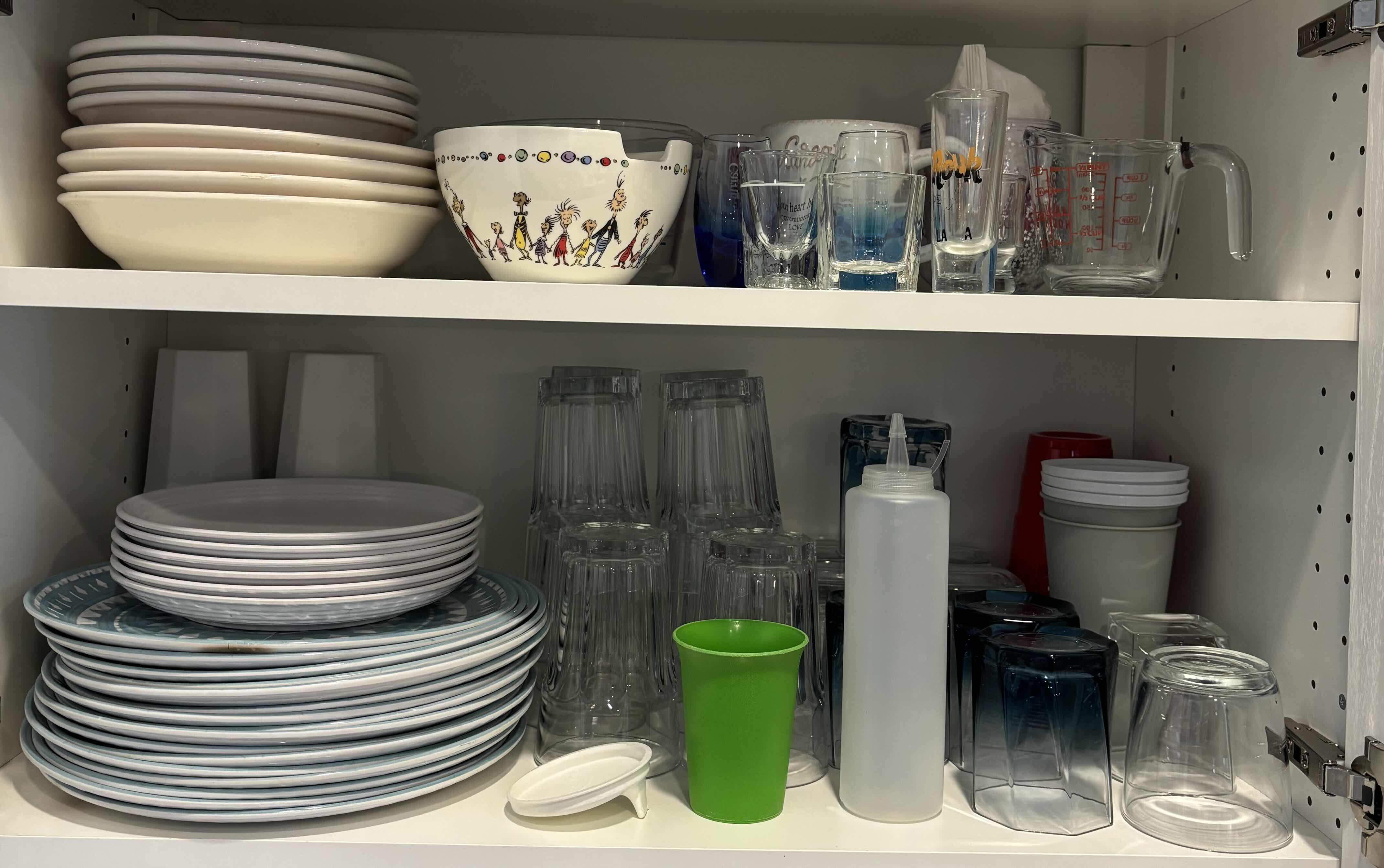 Photo 1 of CONTENTS OF KITCHEN CABINET