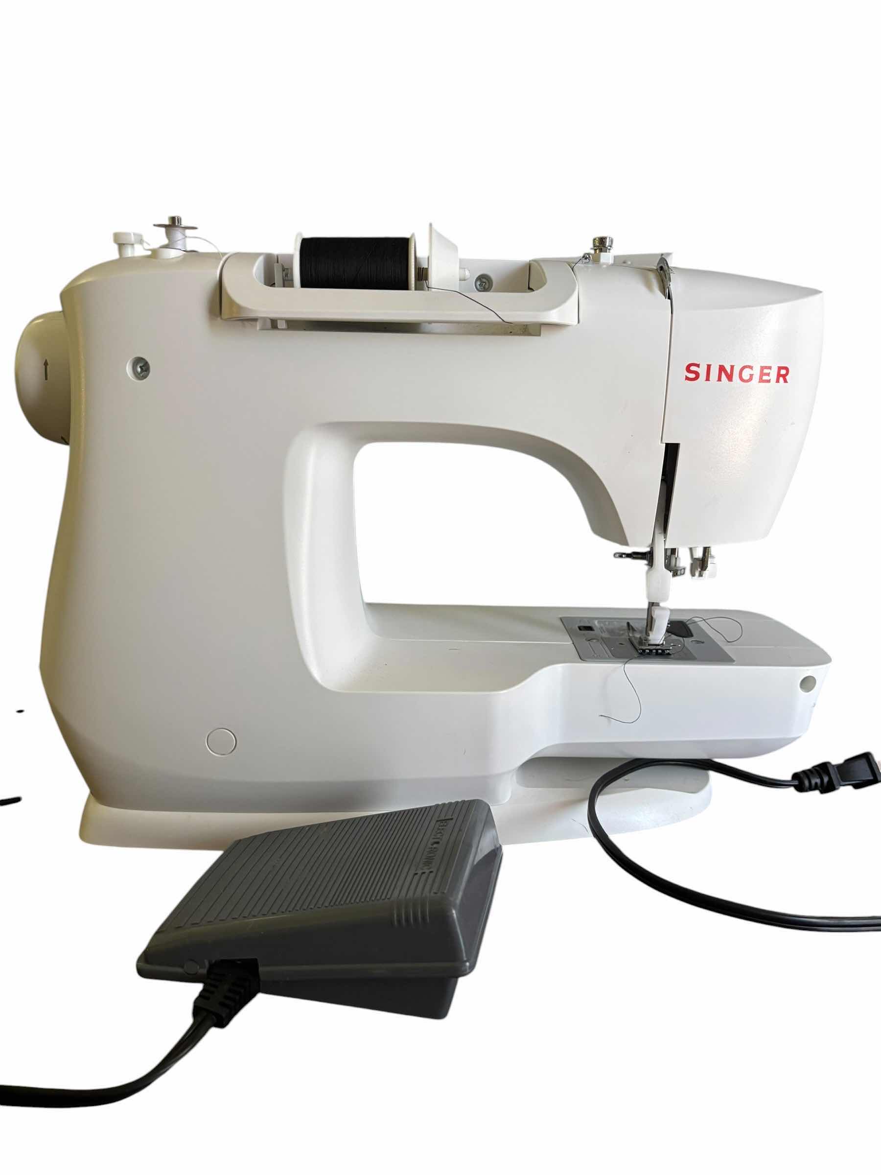 Photo 1 of SINGER SEWING MACHINE
