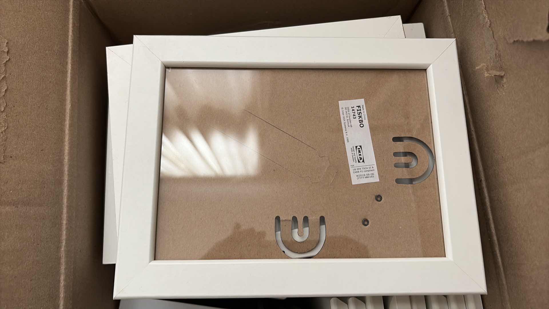 Photo 1 of BOX OF WHITE PICTURE FRAMES -MOST ARE NEW