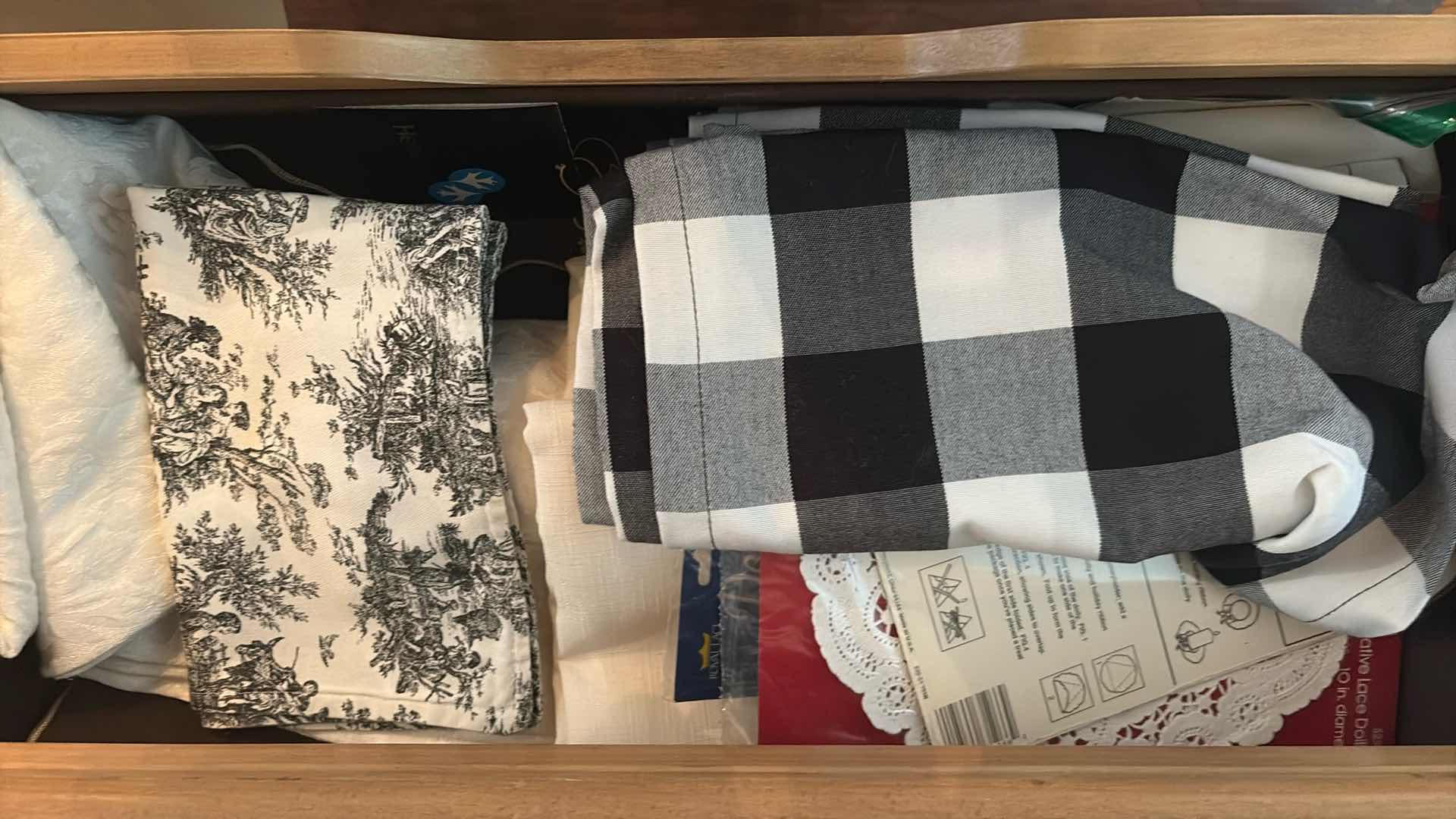 Photo 1 of CONTENTS OF CURIO CABINET DRAWERS- TABLE RUNNERS, COVERS AND PLACEMATS