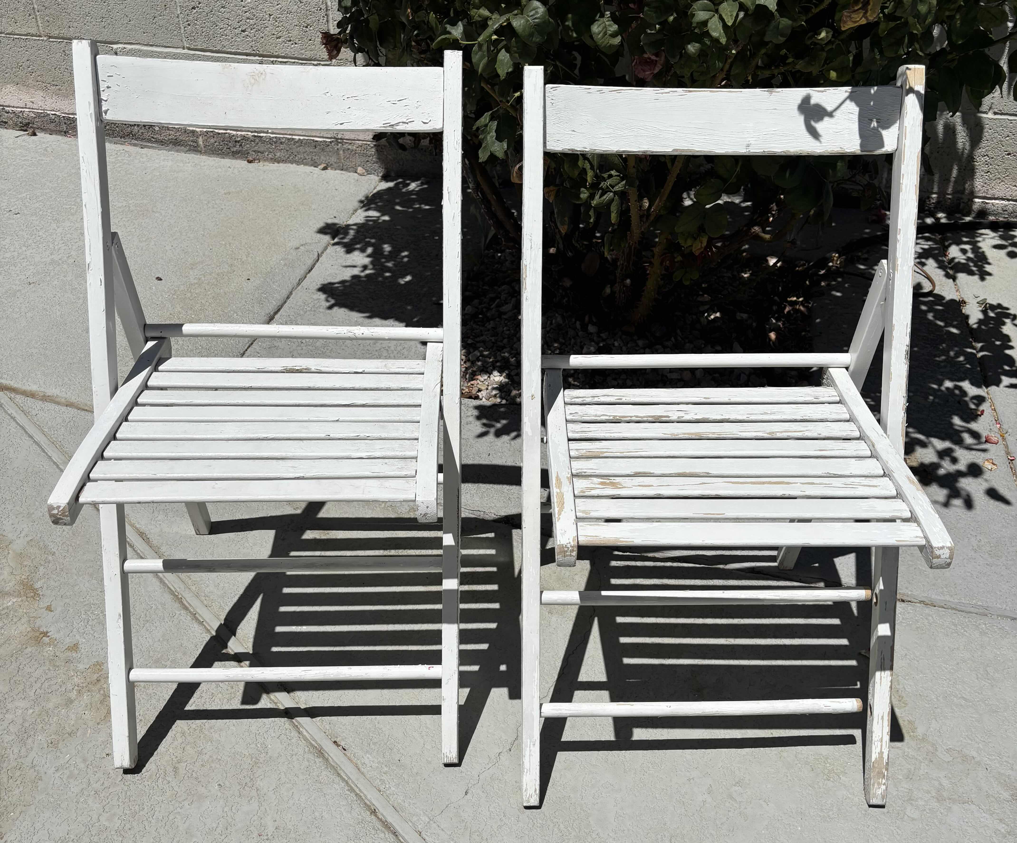 Photo 1 of OUTDOOR WOODEN FOLDING CHAIRS (2) H31”