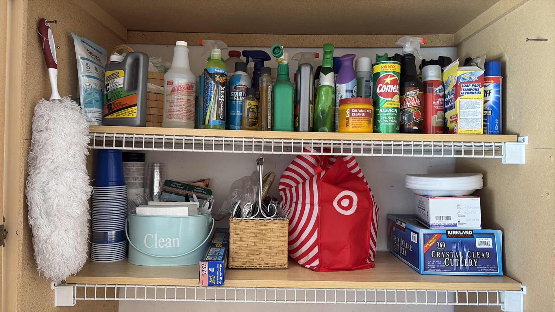 Photo 1 of SHELVES OF CLEANING SUPPLIES , PLASTIC CUTLERY AND BAKING DISHES