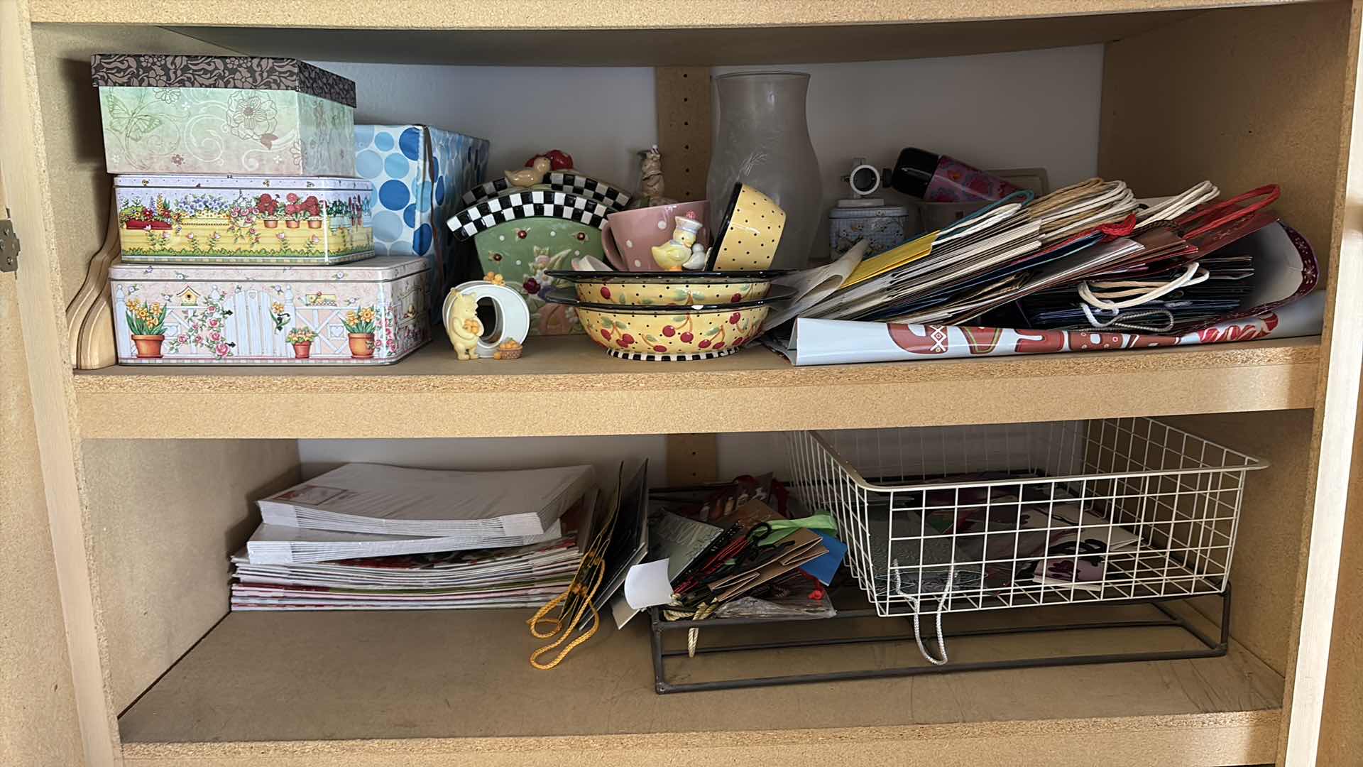 Photo 1 of CONTENTS OF GARAGE-GIFT BAGS, T SHIRT BOXES, CERAMIC DECOR