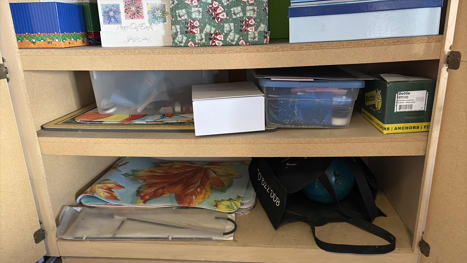 Photo 1 of CONTENTS OF GARAGE SHELVING—GIFT BOXES, PLACE MATS AND MORE