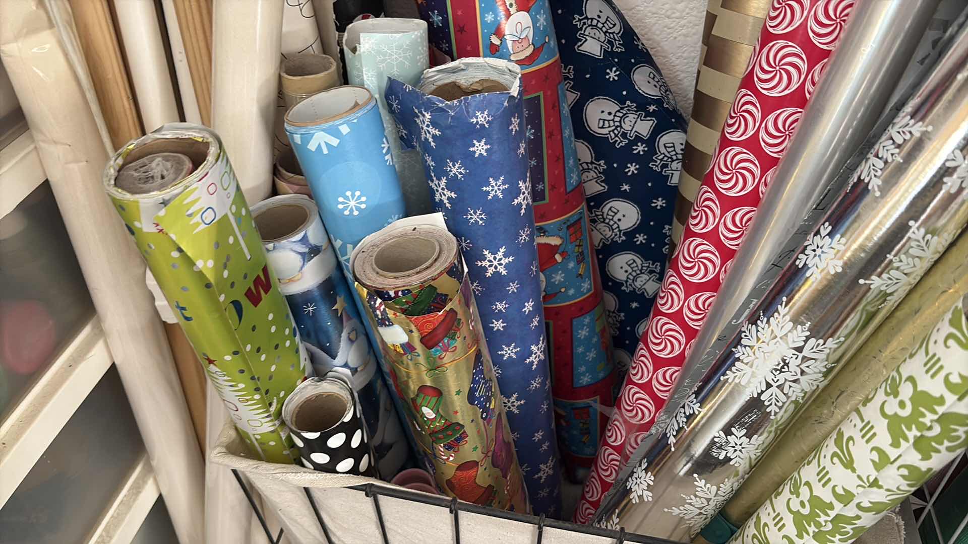 Photo 1 of BASKET OF WRAPPING PAPER