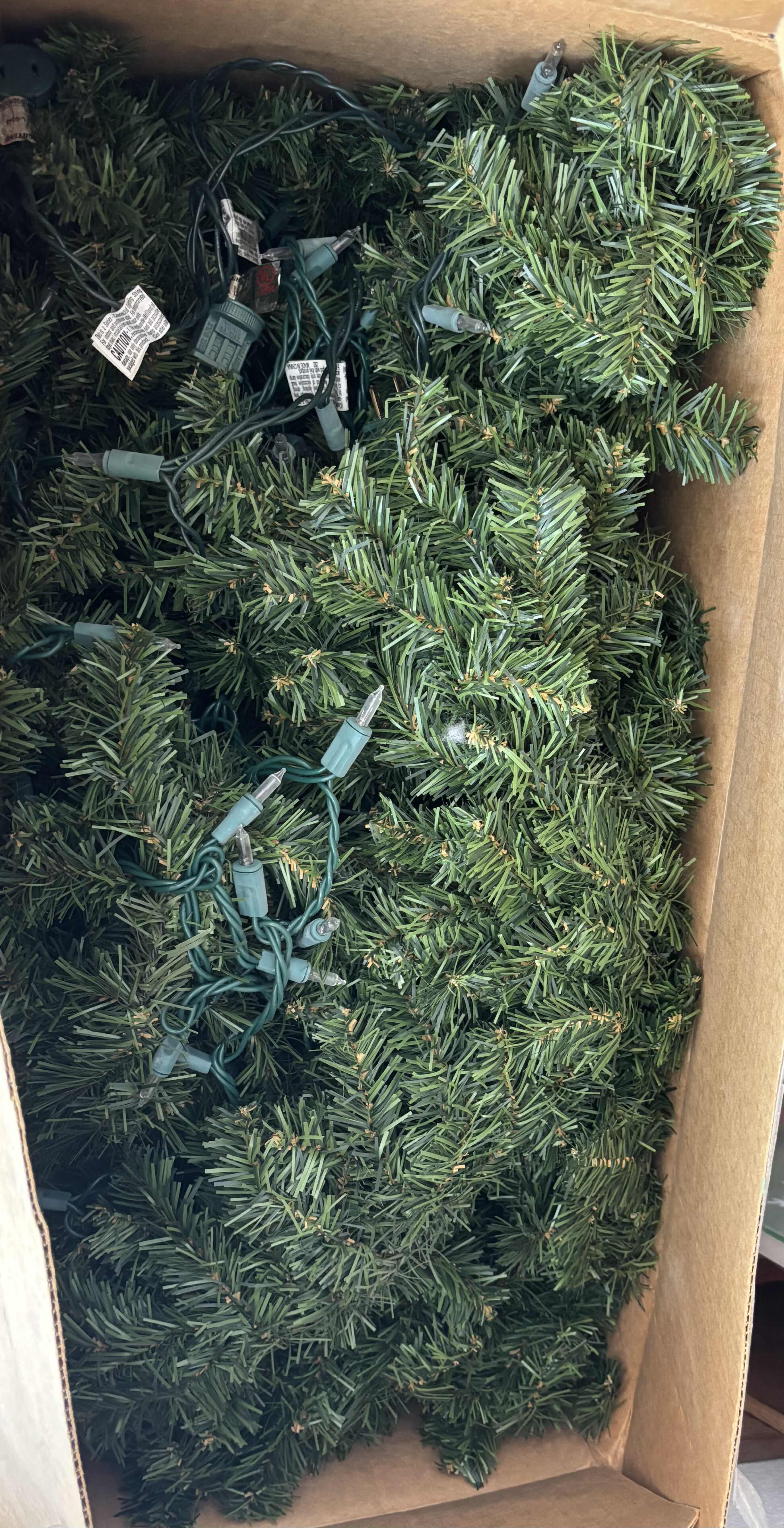 Photo 1 of BOX OF LIGHTED CHRISTMAS GARLAND (LENGTH OR NUMBER OF PIECES UNKNOWN)