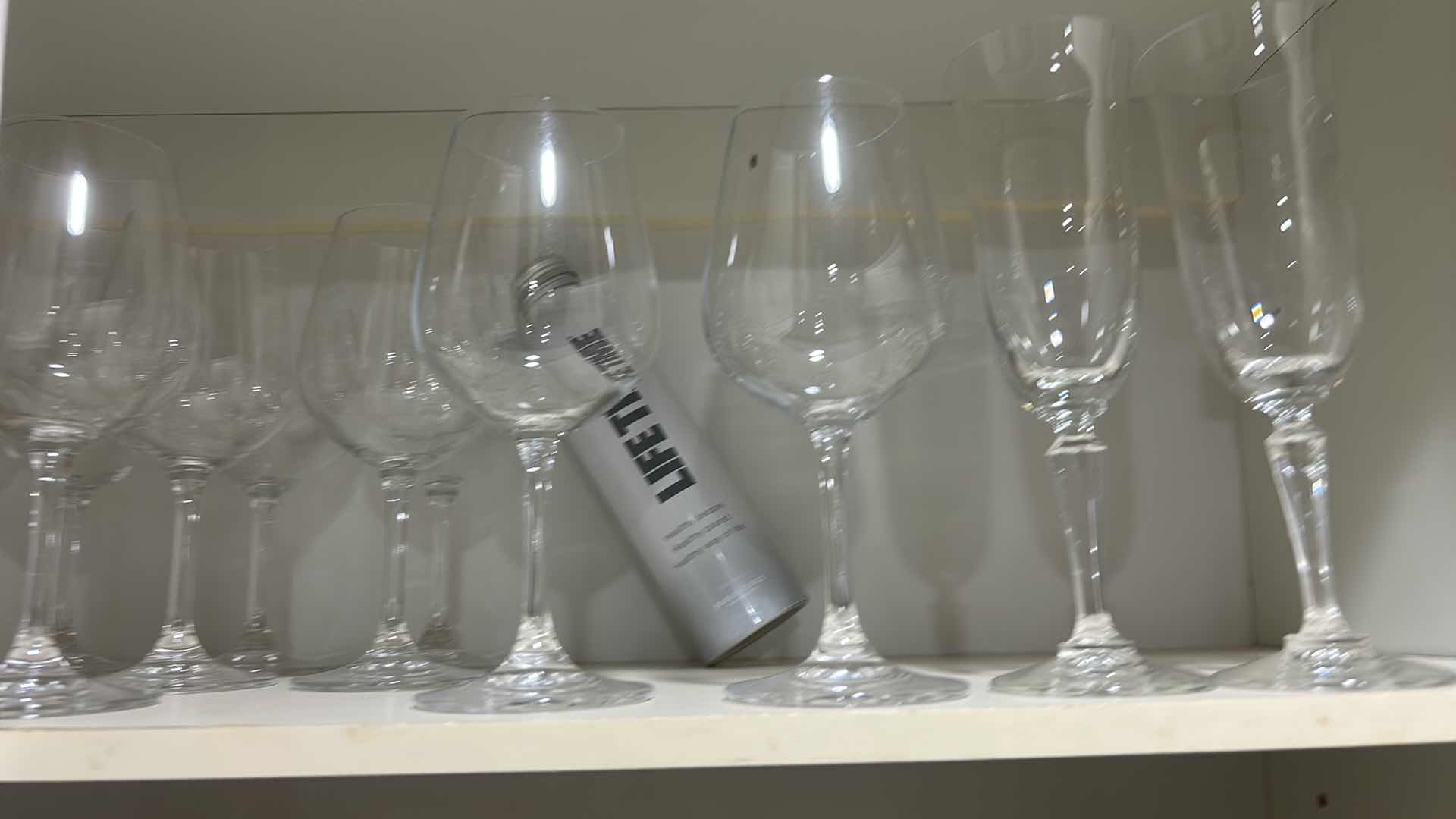 Photo 1 of CONTENTS OF KITCHEN CABINET , GLASSWARE, STEMWARE, AND MORE