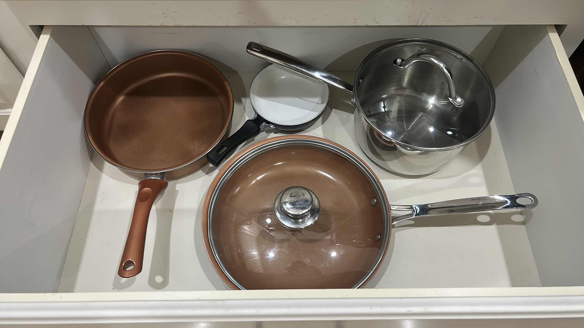 Photo 1 of CONTENTS OF KITCHEN DRAWER, SKILLETS AND MORE