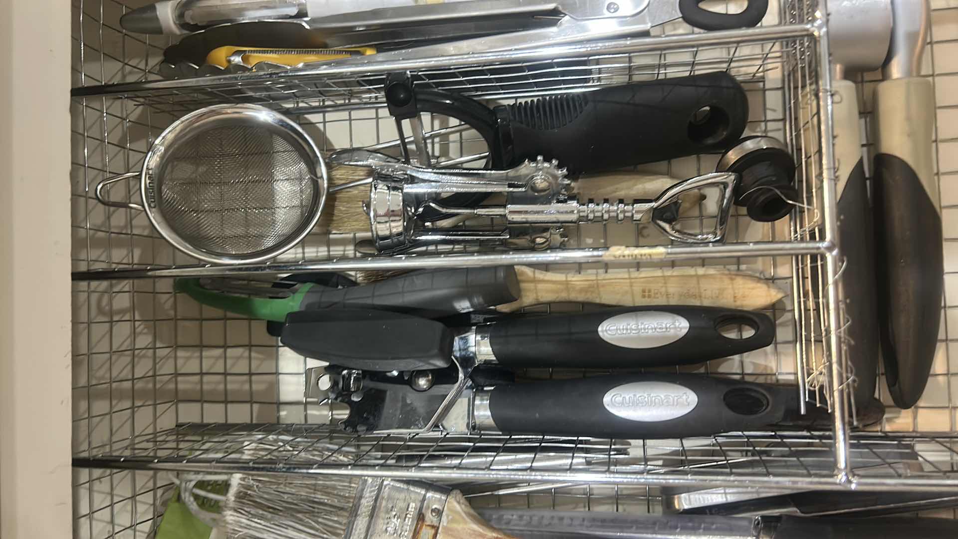 Photo 1 of CONTENTS OF DRAWER IN KITCHEN CAN OPENER BOTTLE OPENERS CHEESE, GRATER, AND