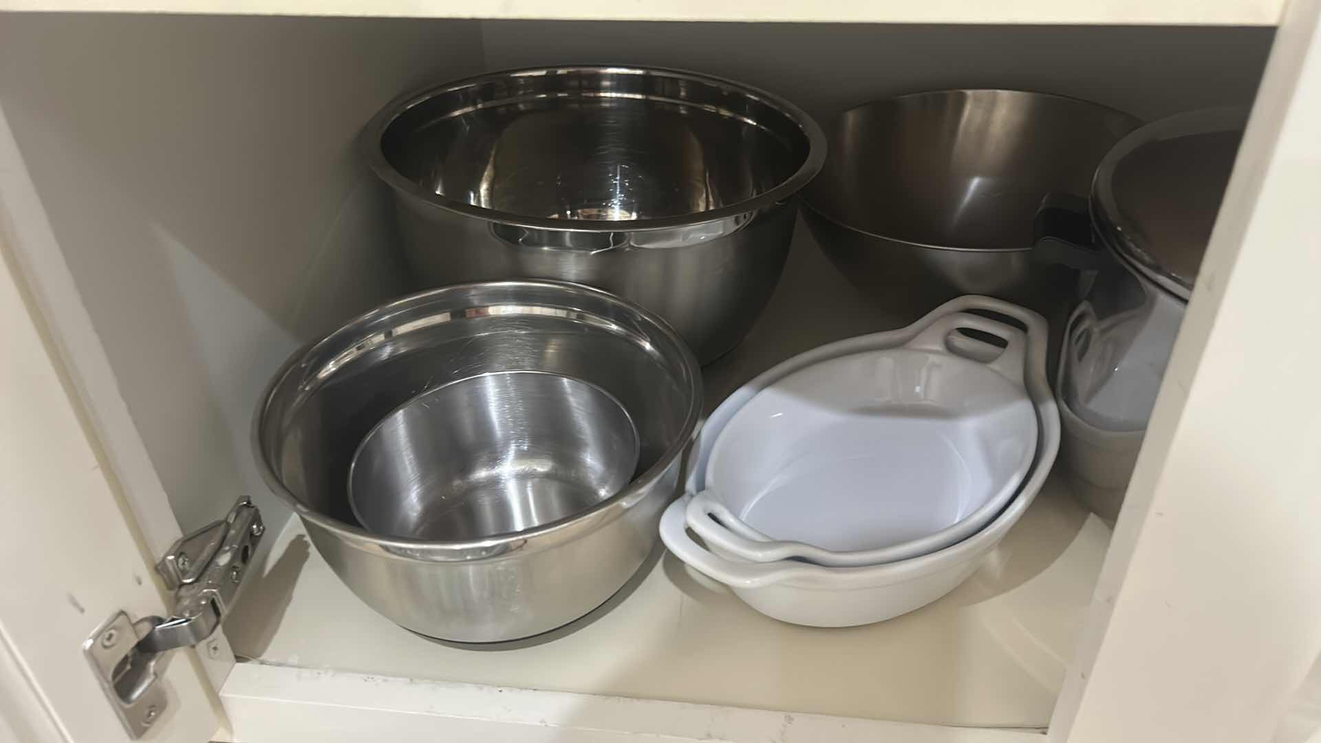 Photo 1 of CONTENT OF CABINET IN KITCHEN, BAKEWARE BOWLS, AND MORE