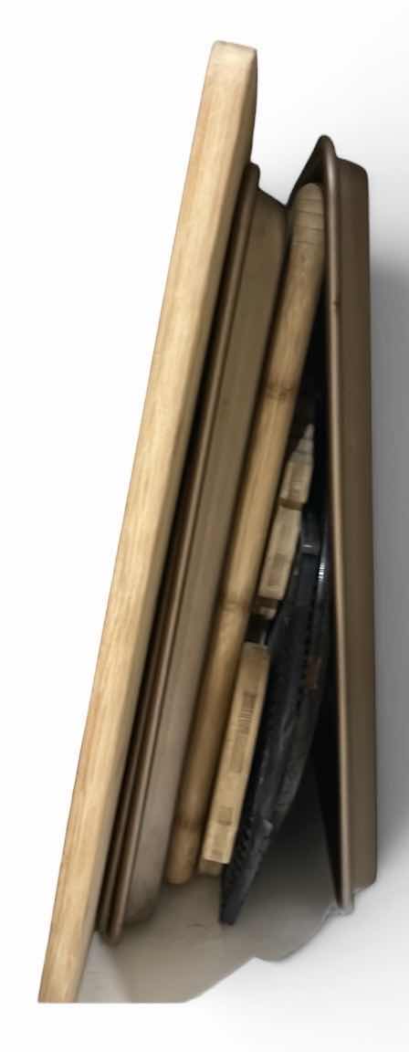 Photo 1 of CONTENTS OF CABINET IN KITCHEN, CUTTING BOARDS BAKING TRAYS