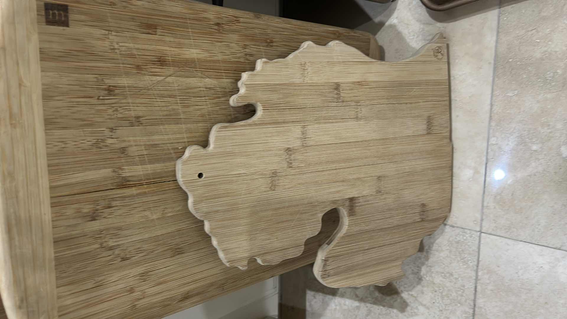 Photo 1 of CONTENTS OF CABINET IN KITCHEN, CUTTING BOARDS BAKING TRAYS