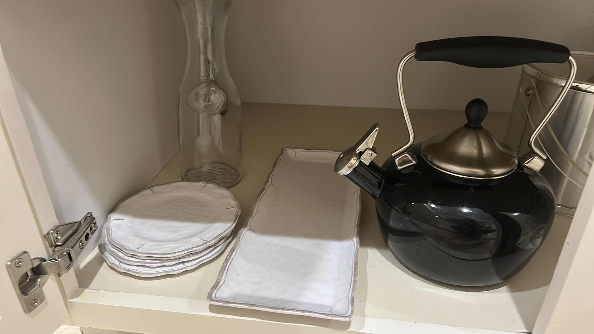 Photo 1 of CONTENTS OF KITCHEN CABINET, MEASURING ITEMS, SERVINGWARE, TEAPOT, AND MORE