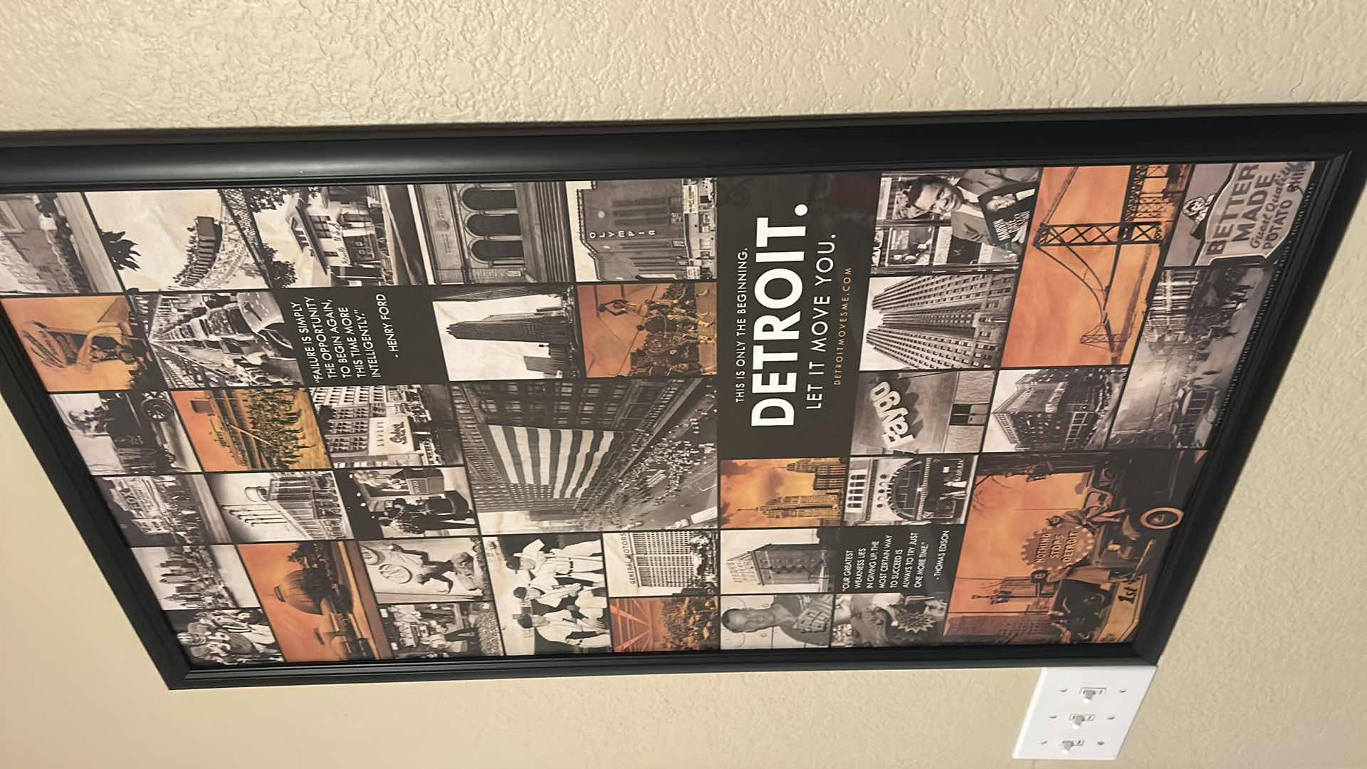 Photo 1 of FRAMED ART PRINT FEATURES A COLLAGE BRANDED WITH THE SLOGAN “DETROIT. LET IT MOVE”. 22 1/4” x H 38 1/4”