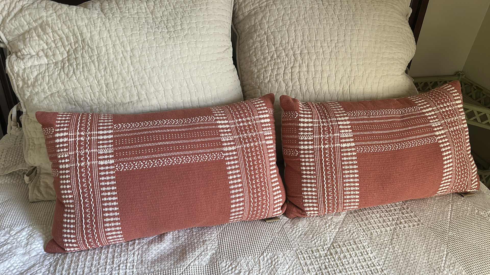 Photo 1 of DARK WOOD PLATFORM BED FEATURING A SLEIGH-STYLE HEADBOARD, MATCHING FOOTBOARD, AND NEUTRAL QUILTED BEDDING WITH ACCENT PILLOWS. INCLUDES SERTA QUEEN MATTRESS. (MATTRESS MEASURES 5 FEET X 81” INCHES HEADBOARD HEIGHT 52 1/2 INCHES)