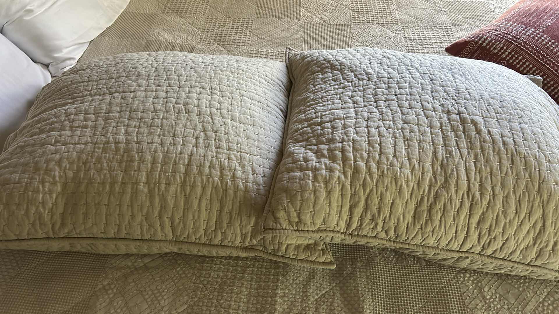 Photo 1 of DARK WOOD PLATFORM BED FEATURING A SLEIGH-STYLE HEADBOARD, MATCHING FOOTBOARD, AND NEUTRAL QUILTED BEDDING WITH ACCENT PILLOWS. INCLUDES SERTA QUEEN MATTRESS. (MATTRESS MEASURES 5 FEET X 81” INCHES HEADBOARD HEIGHT 52 1/2 INCHES)