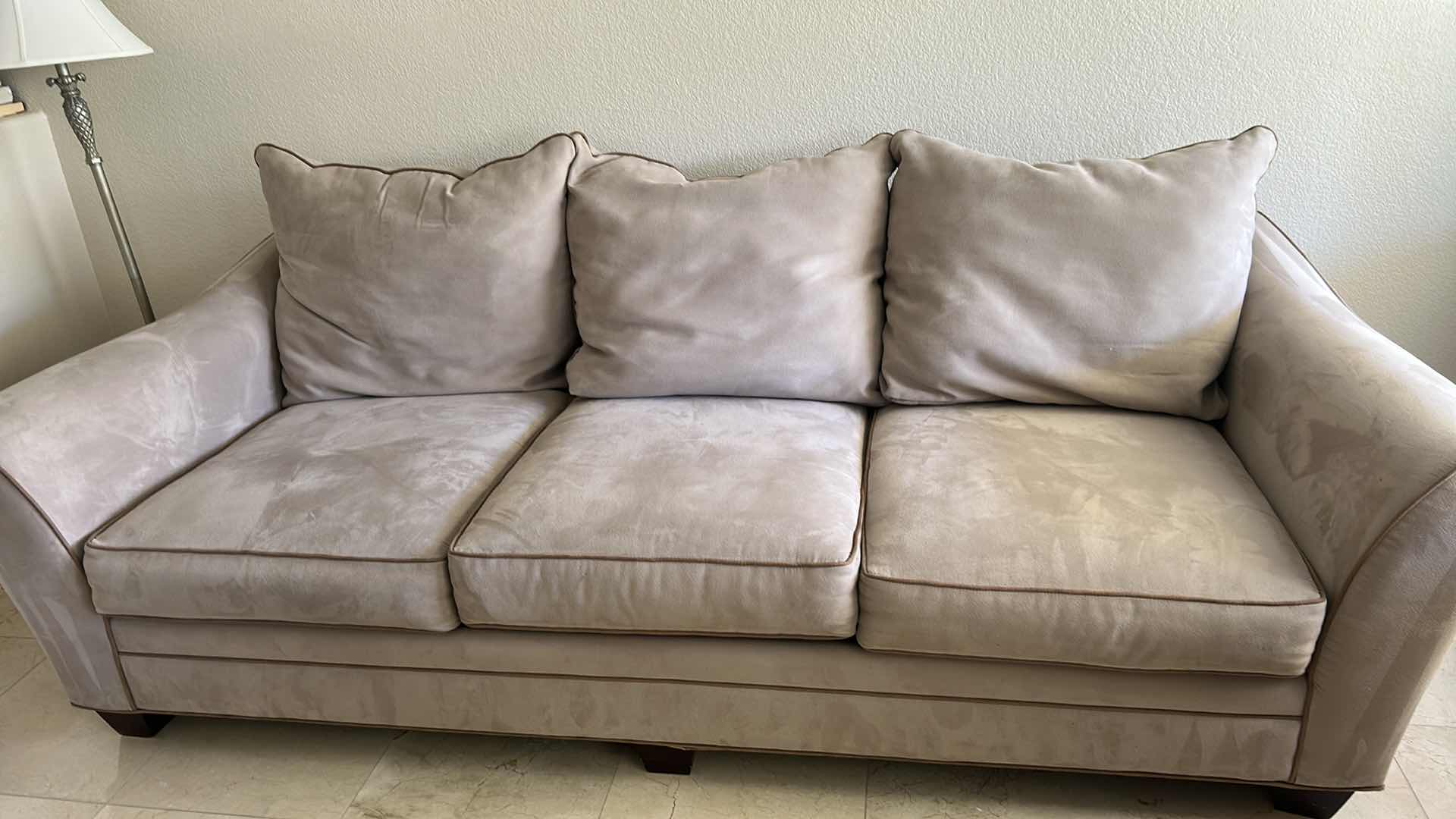 Photo 1 of BEIGE MICROFIBER 7FT SOFA W COMFORTABLE BACK CUSHIONS & FLARED ARMS