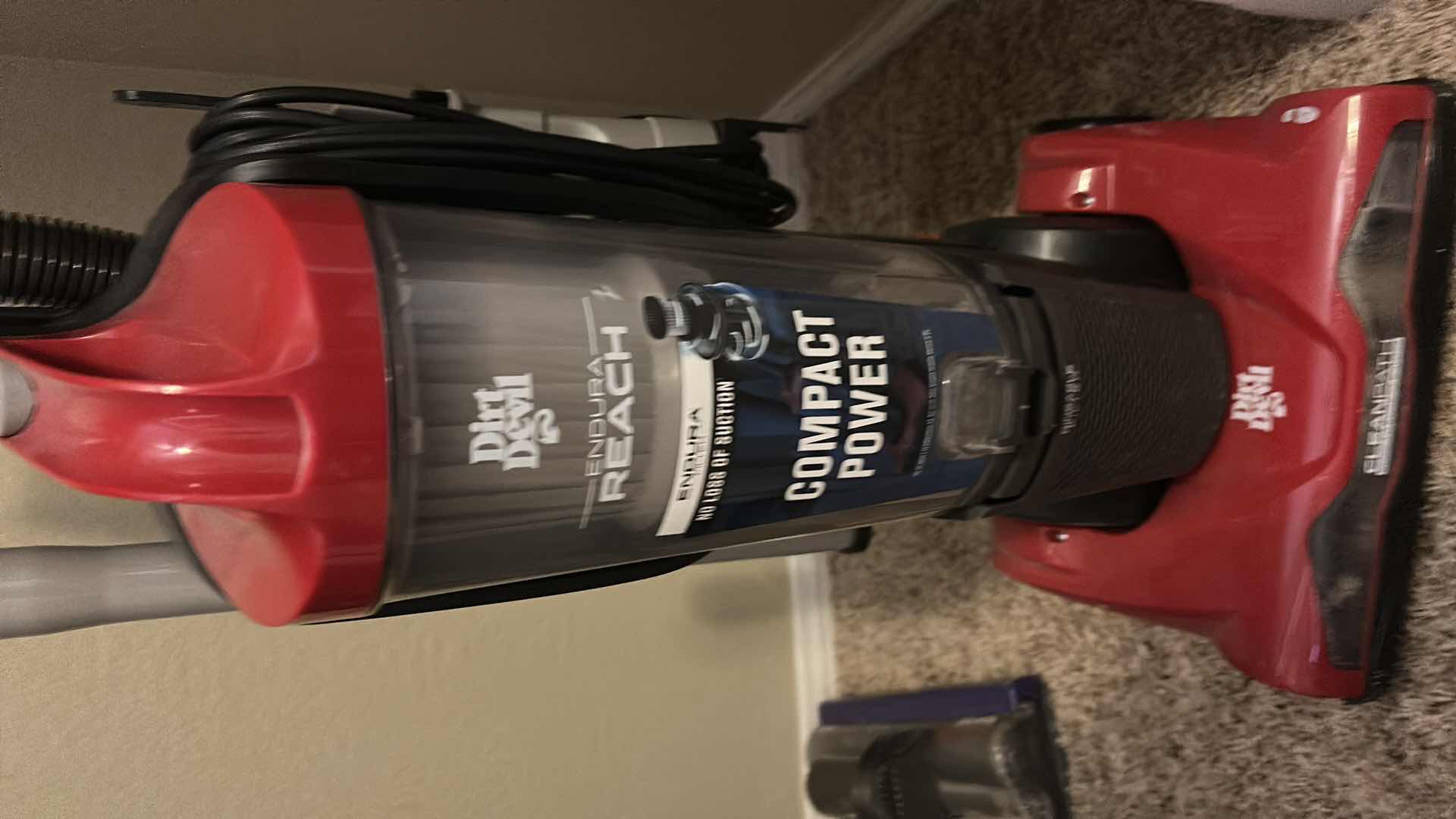 Photo 1 of DIRT DEVIL ENDURA REACH BAGLESS UPRIGHT VACUUM CLEANER IN RED.