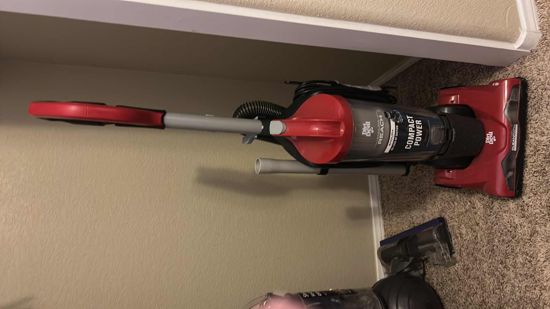 Photo 1 of DIRT DEVIL ENDURA REACH BAGLESS UPRIGHT VACUUM CLEANER IN RED.