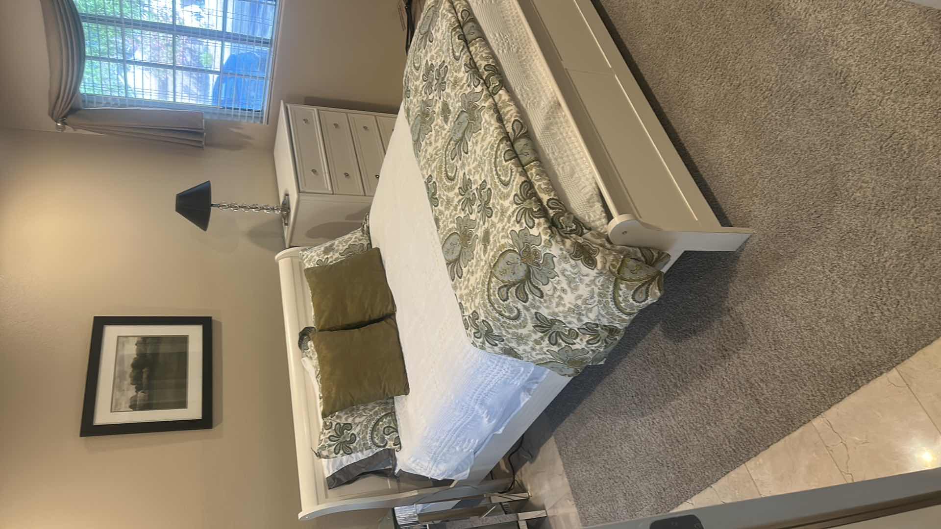 Photo 1 of WHITE SLEIGH BED FRAME FEATURING A CURVED HEADBOARD AND FOOTBOARD, SEALY QUEEN MATTRESS, & BEDDING (HEADBOARD HEIGHT 43”