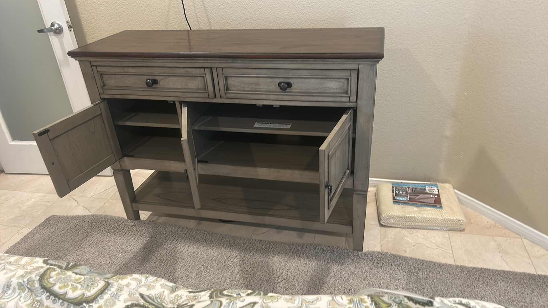 Photo 1 of PIKE & MAIN COLLIN 47” ACCENT CONSOLE FEATURES A DISTRESSED GRAY BASE WITH A DARK WOOD TOP. 47 x 16“ x H36“ $279
