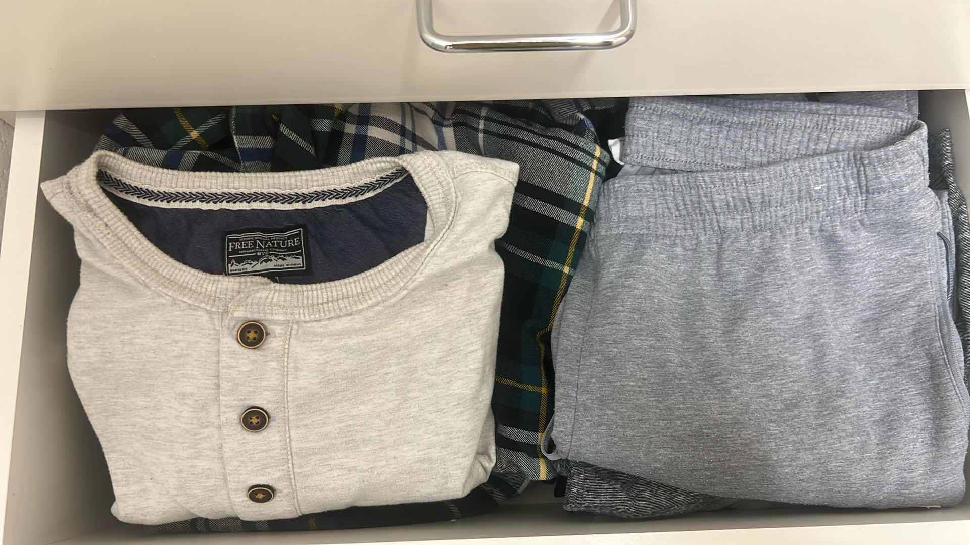 Photo 1 of CONTENTS OF 4 DRAWERS DENIM 36" X 30" SOCKS MENS BATHING SUITS SIZE MED LARGE