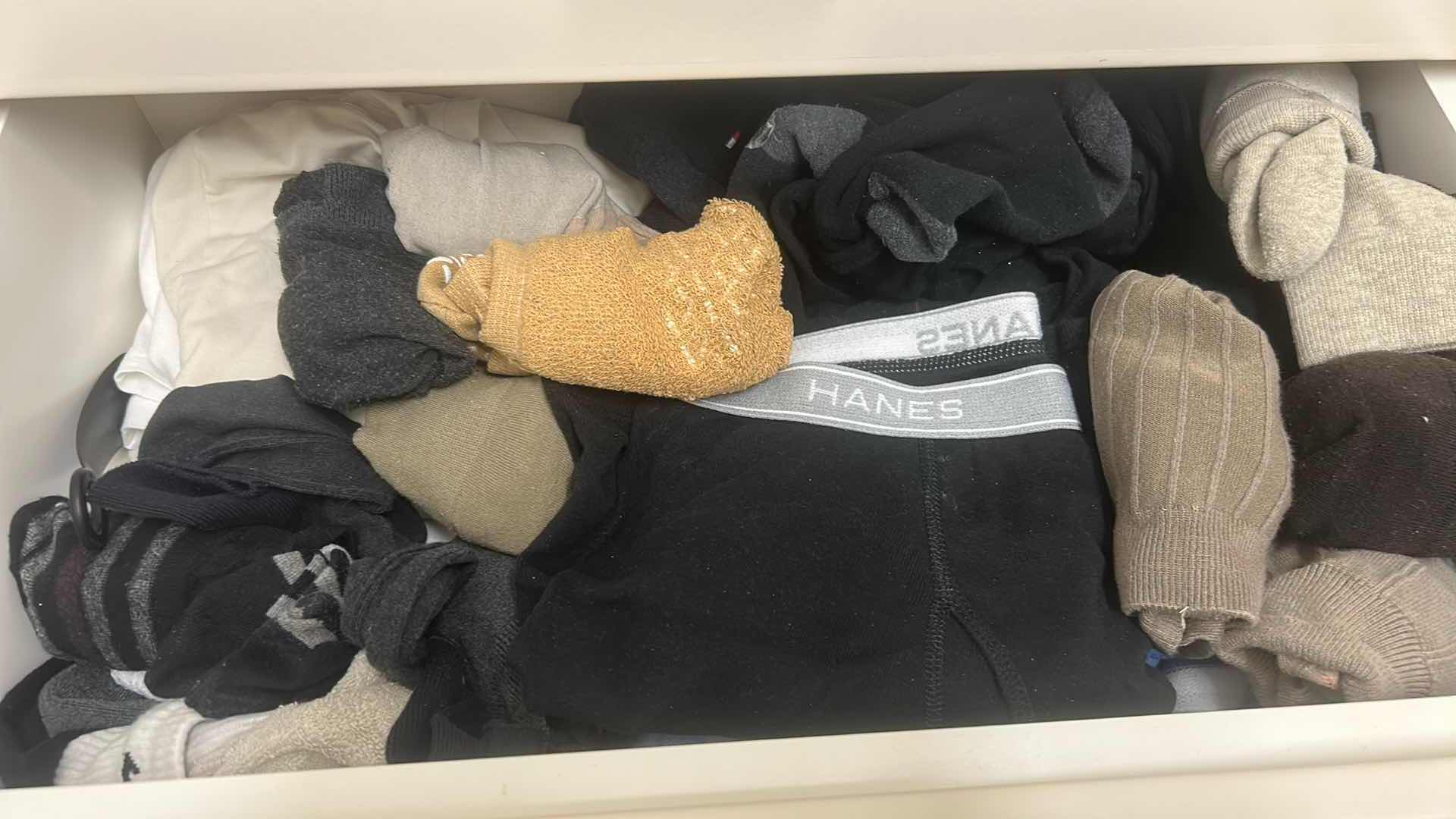 Photo 1 of CONTENTS OF 4 DRAWERS DENIM 36" X 30" SOCKS MENS BATHING SUITS SIZE MED LARGE