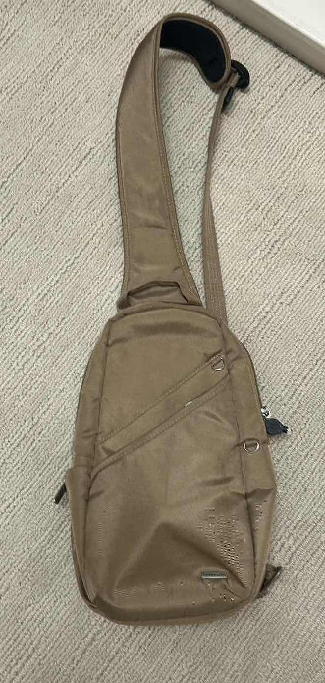 Photo 1 of TRAVELON ANTI THEFT CLASSIC SLING BAG TAUPE W SLASH RESISTANT MESH PANELS