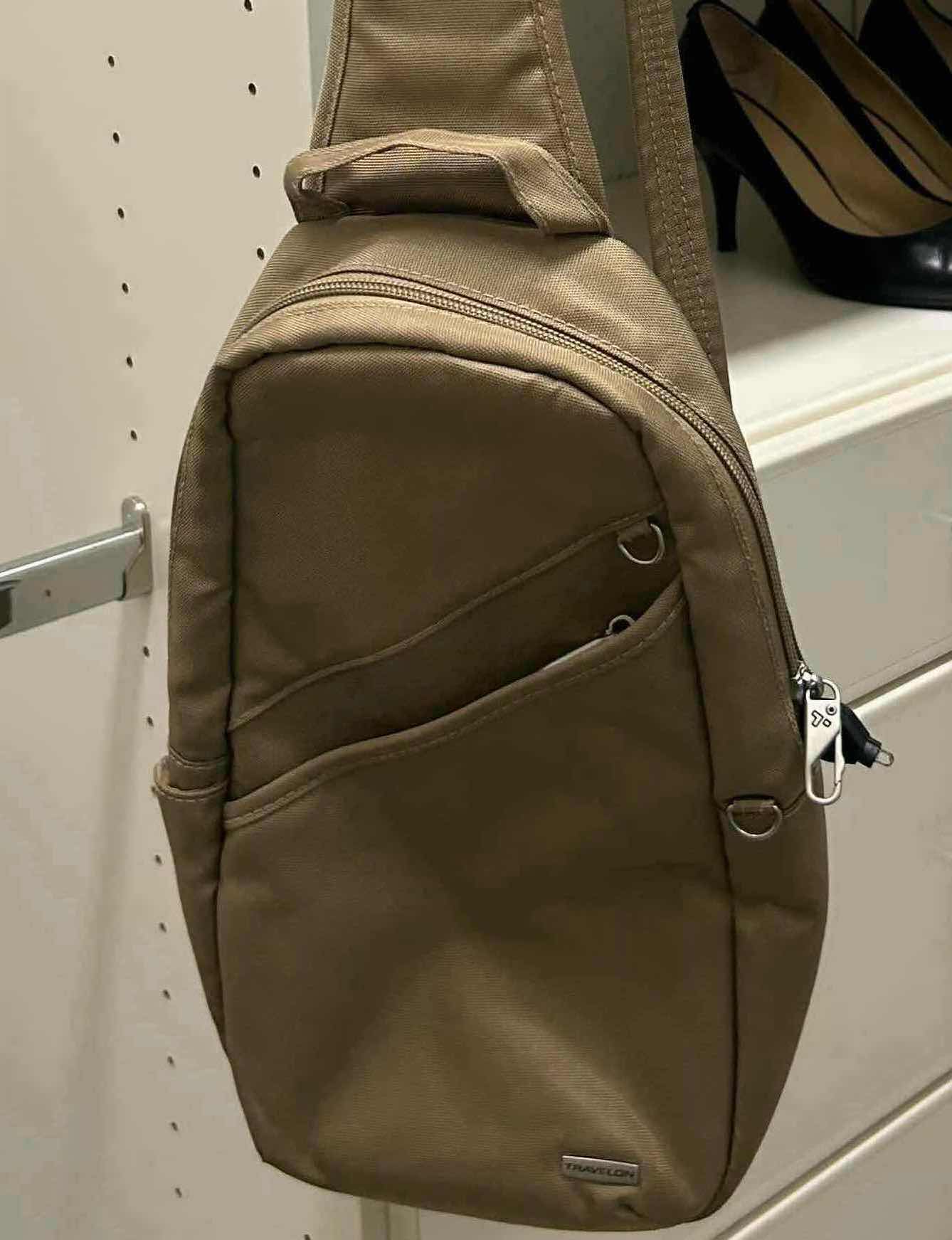 Photo 1 of TRAVELON ANTI THEFT CLASSIC SLING BAG TAUPE W SLASH RESISTANT MESH PANELS