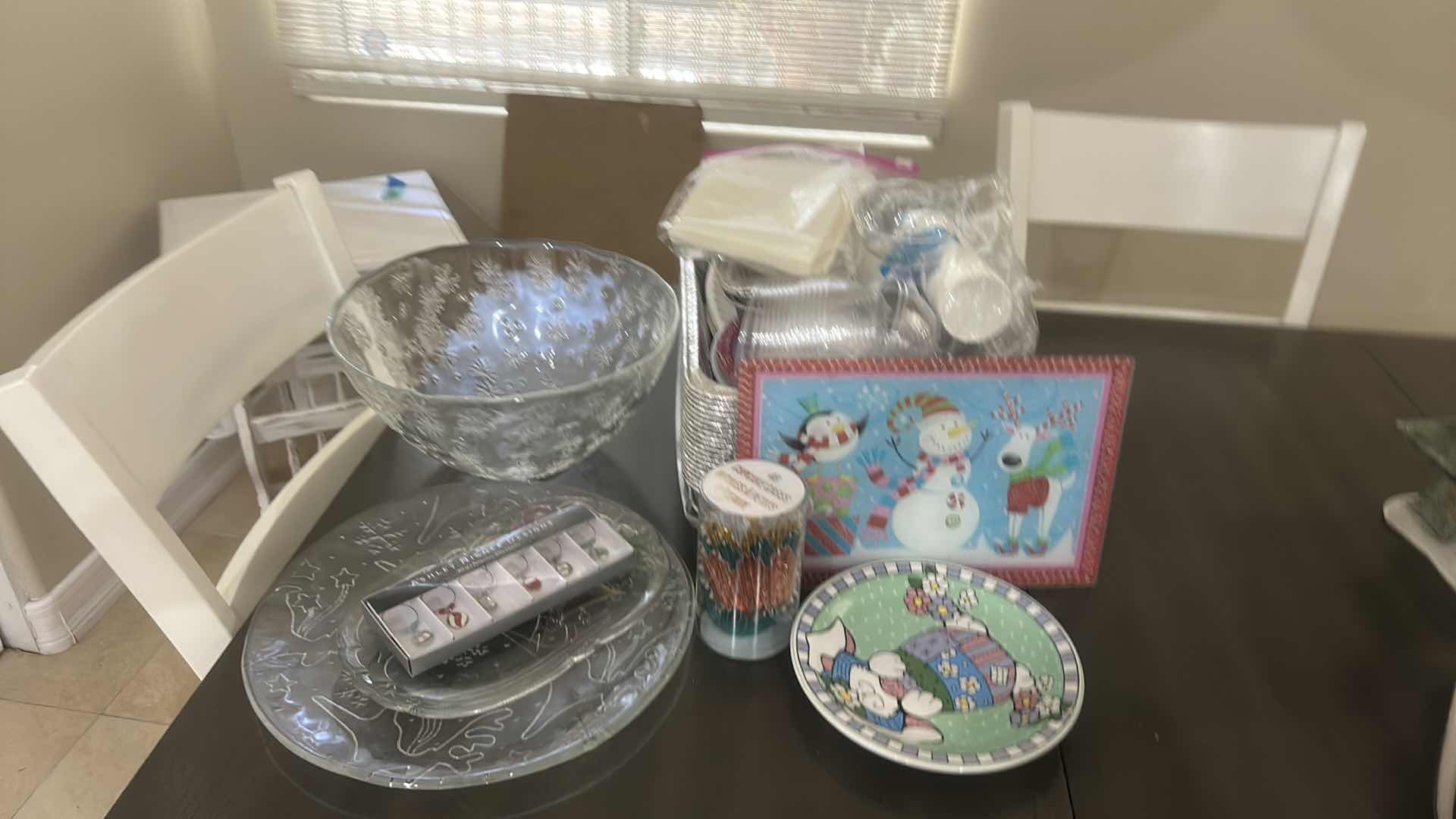 Photo 1 of ASSORTED GLASS SERVING PIECES, HOLIDAY PAPER GOODS, CUPS, NAPKINS, STRAWS, AND DECORATIVE PLATES.