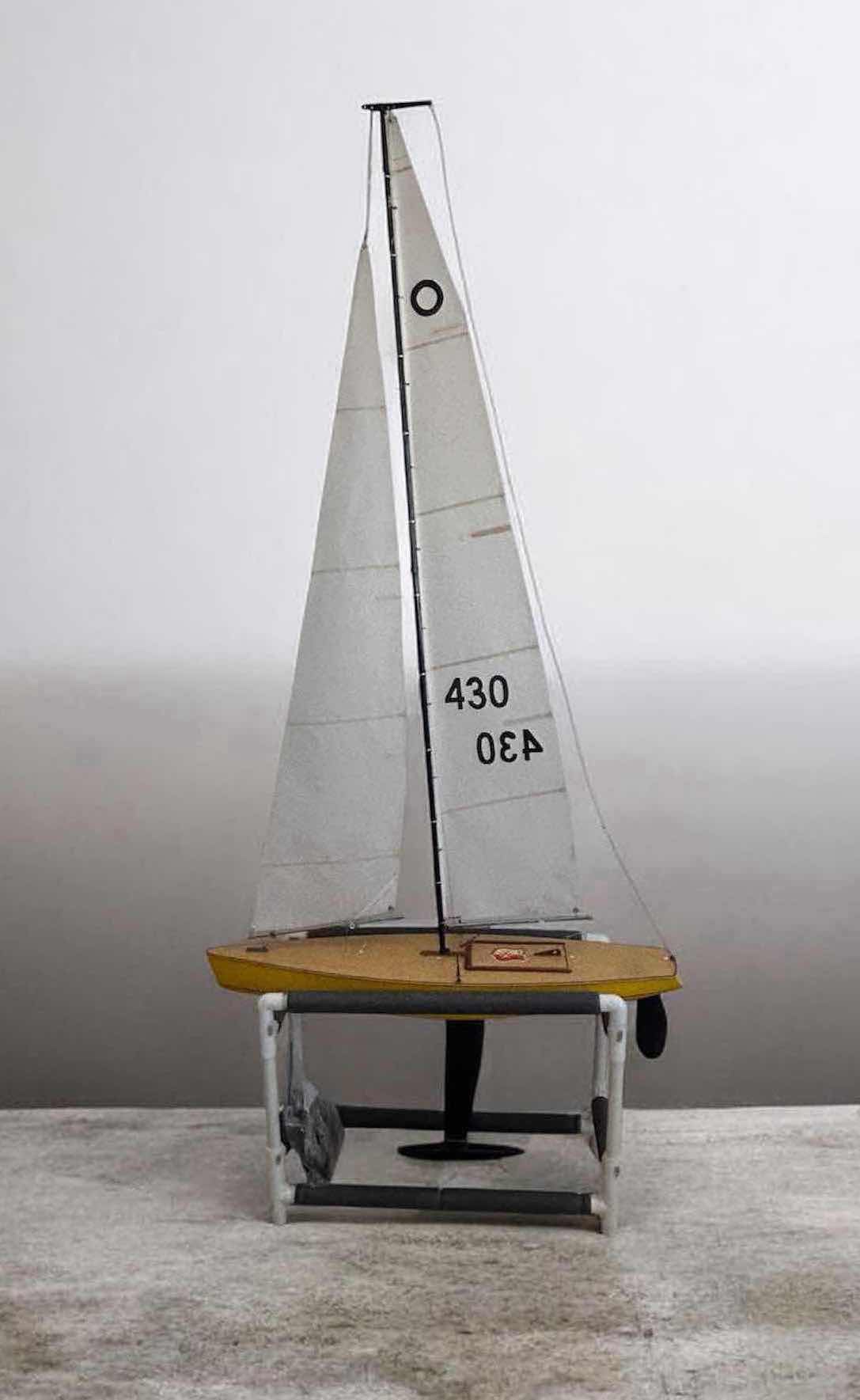 Photo 1 of AZETONE INTERNATIONAL ONE METER (IOM) RADIO CONTROLLED SAILBOAT W DISTINCTIVE YELLOW HULL & RADIO
