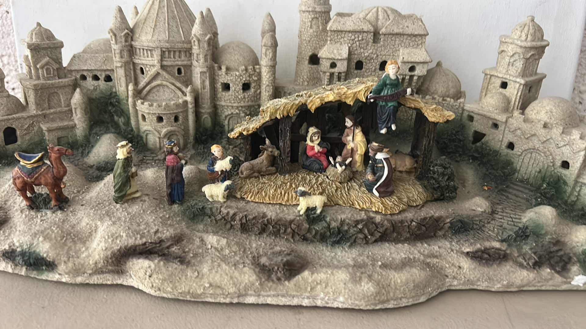 Photo 1 of DECORATIVE HEAVY RESIN TEXTURED NATIVITY SCENE W INTERNAL LIGHTING & PLAYS " LITTLE TOWN OF BETHLEHEM" 19” x H7”