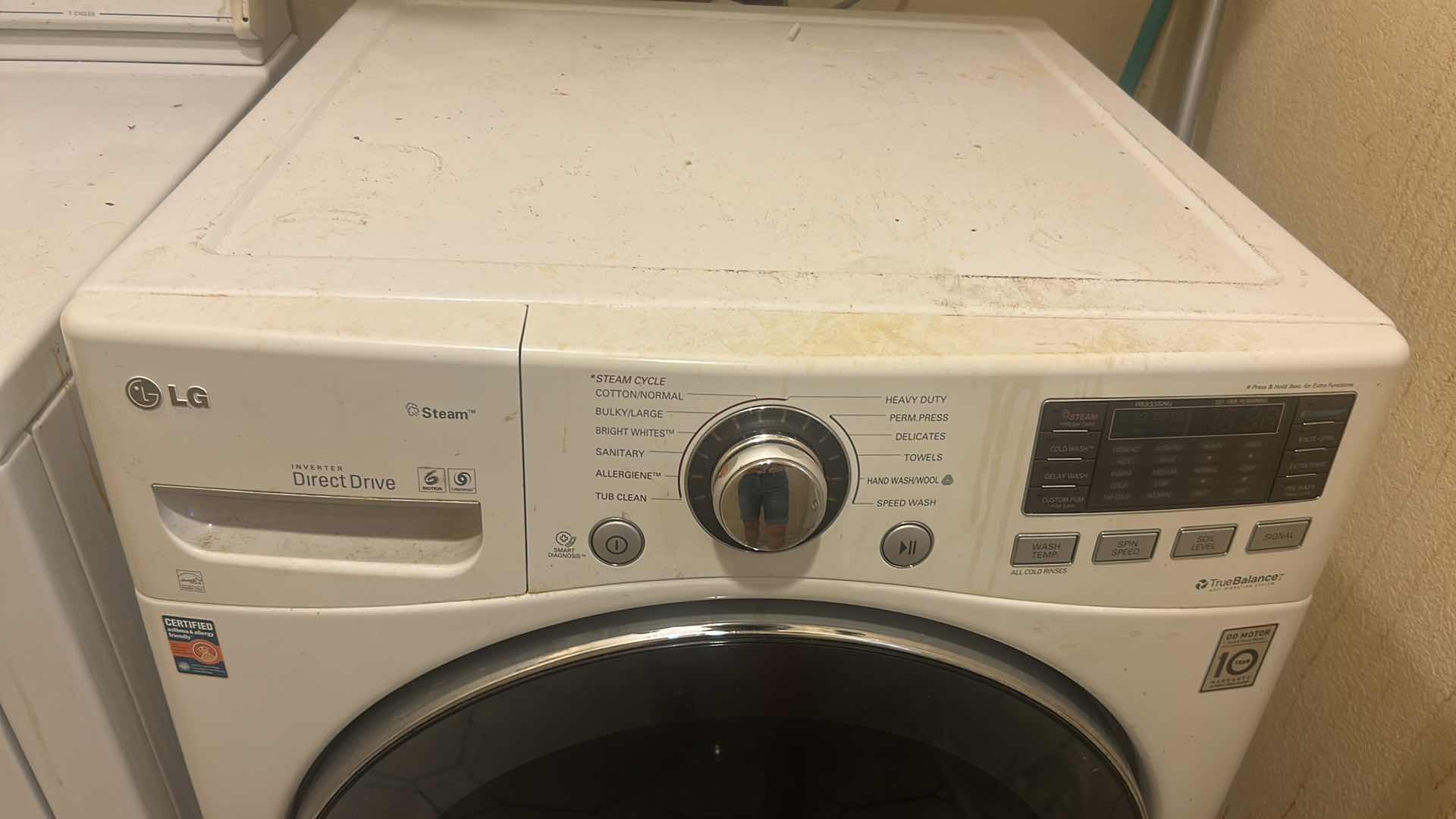 Photo 1 of WHITE LG FRONT LOAD WASHER STEAM CYCLE