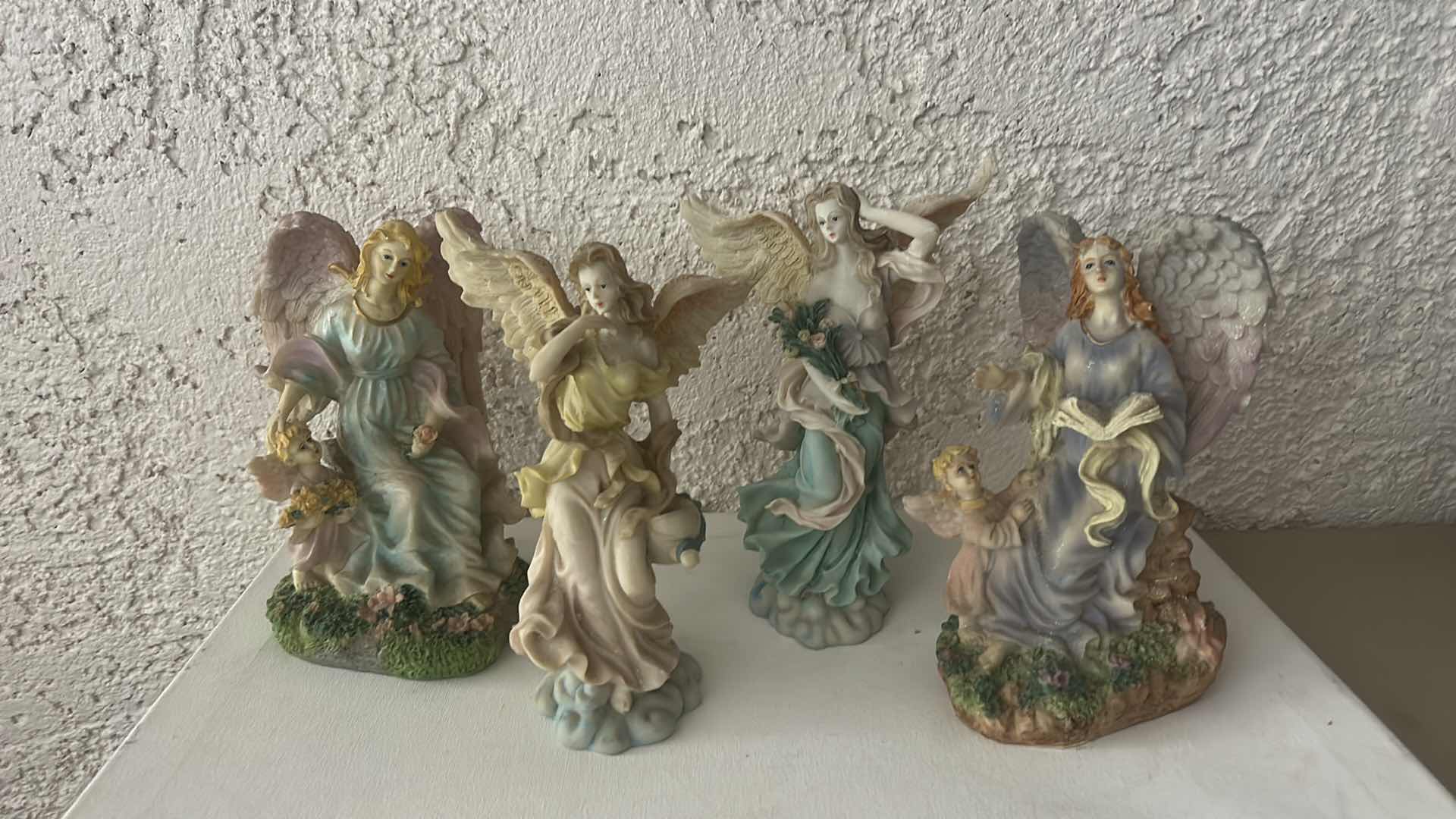 Photo 1 of 4- RESIN ANGEL FIGURINES H8.5”