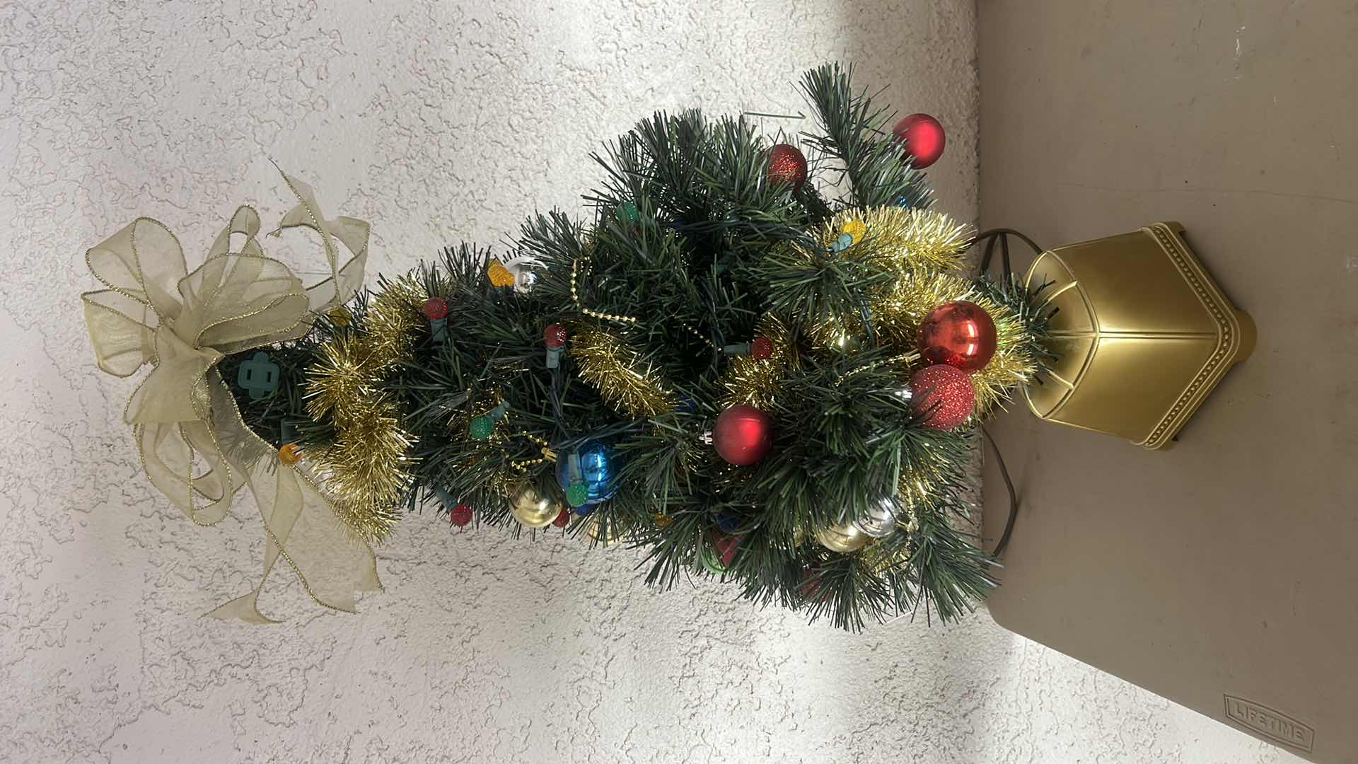 Photo 1 of DECORATED MINATURE CHRISTMAS TREE W LIGHTS H30”